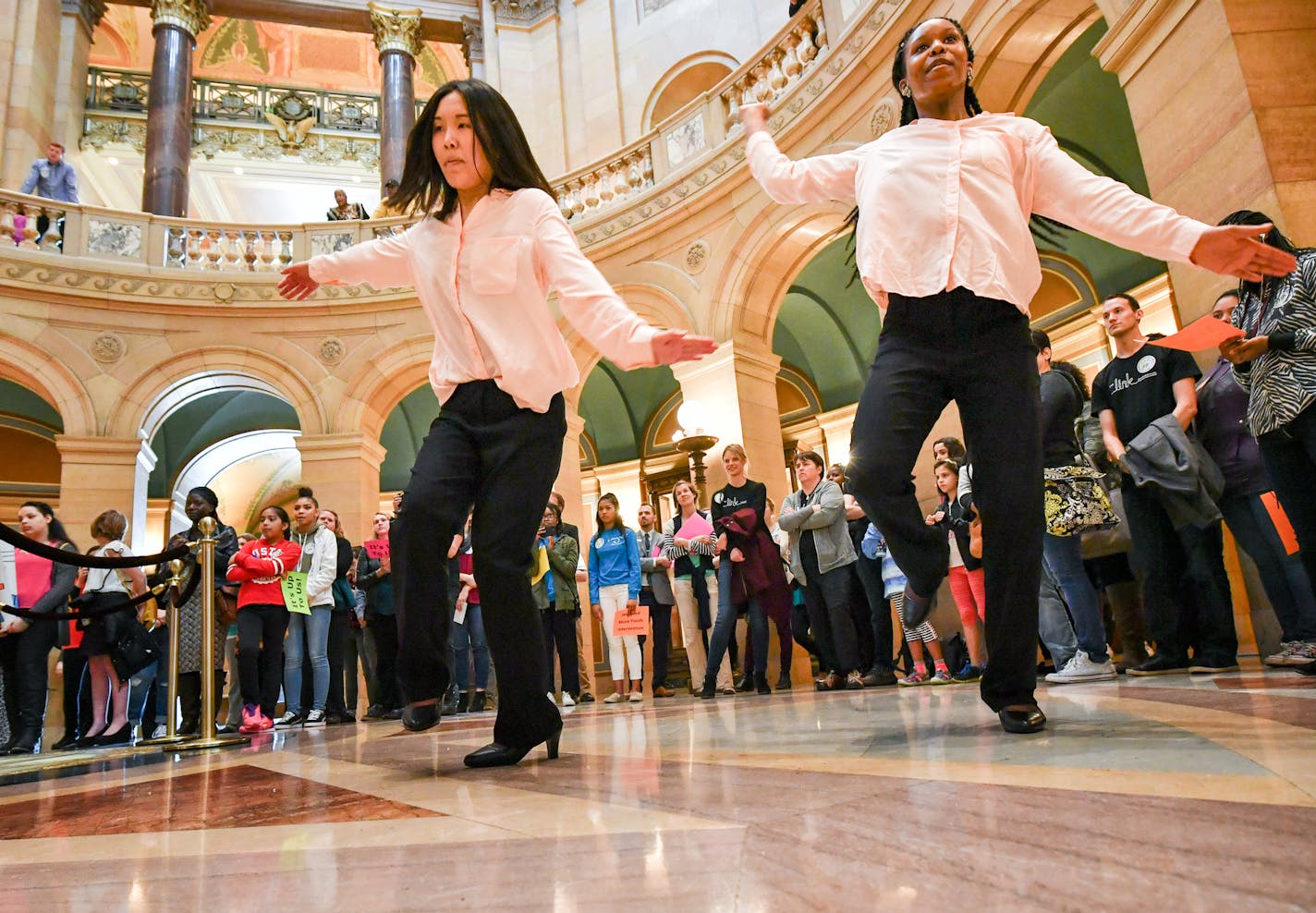 Rotunda dance: Pa Vang and Joy Cephus of the Robbinsdale Cooper High School Hawks Step Team danced in the Capitol last week to promote the Youth Intervention Programs Association, which advocates for young people.