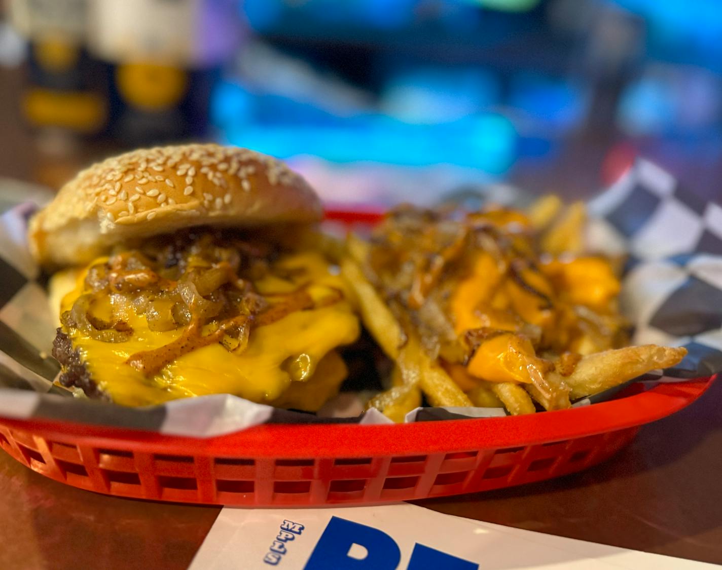 The smashburger and "wild style" fries topped with grilled onions and cheese at Beckett's in Minneapolis.