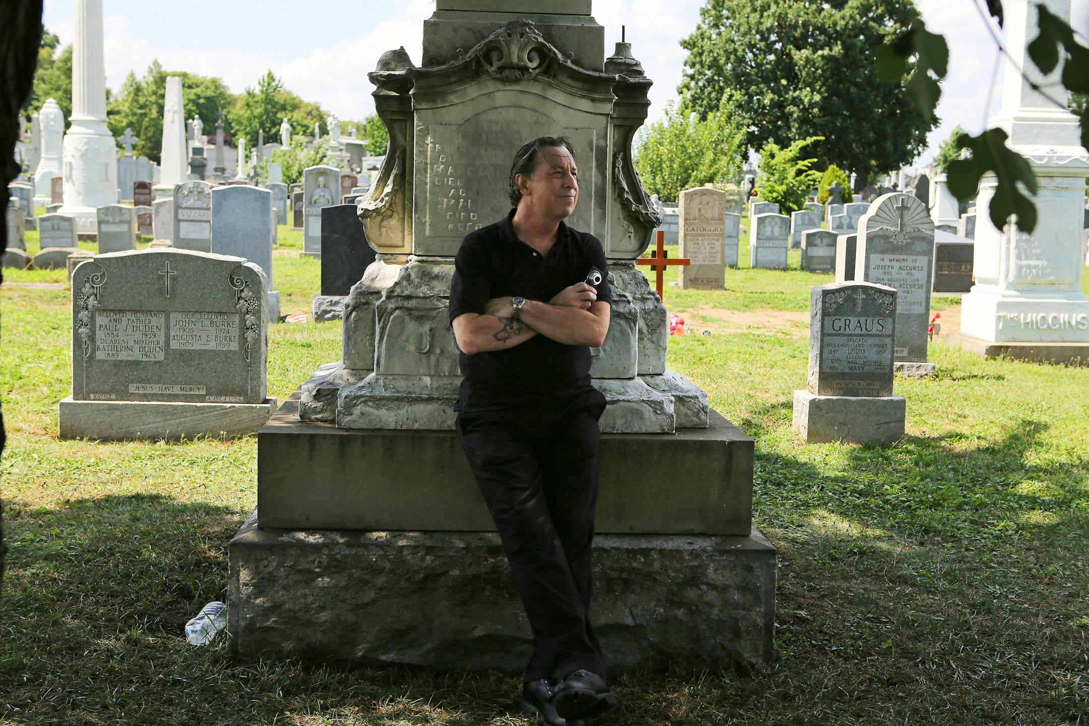 Patric Abedin, who sometimes goes by Nick Beef, a long-held persona, at the Calvary Cemetery in New York, Aug. 2, 2013. Conspiracy theorists and assassination buffs have been vexed for 15 years by the appearance of a granite marker with the engraving "Nick Beef" next to Lee Harvey Oswald's grave, a burial plot Abedin purchased over a decade ago.