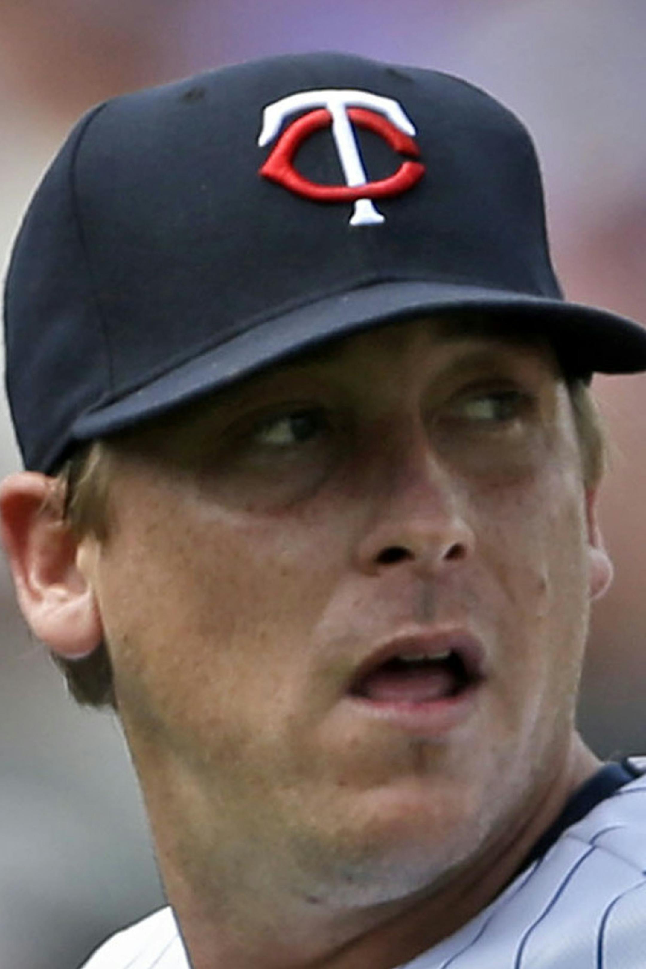 Minnesota Twins starting pitcher Kevin Correia (30) reacts after giving up a two-run homer to Pittsburgh Pirates third baseman Pedro Alvarez during the third inning of an exhibition baseball game, Wednesday, March 12, 2014, in Fort Myers, Fla. (AP Photo/Gerald Herbert)