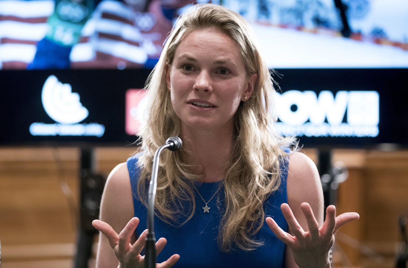 Winter Olympic cross-country skier gold medalist Jessie Diggins speaks about the negative impact climate change is having on winter sports, Wednesday, April 25, 2018, in Washington. (AP Photo/Andrew Harnik)