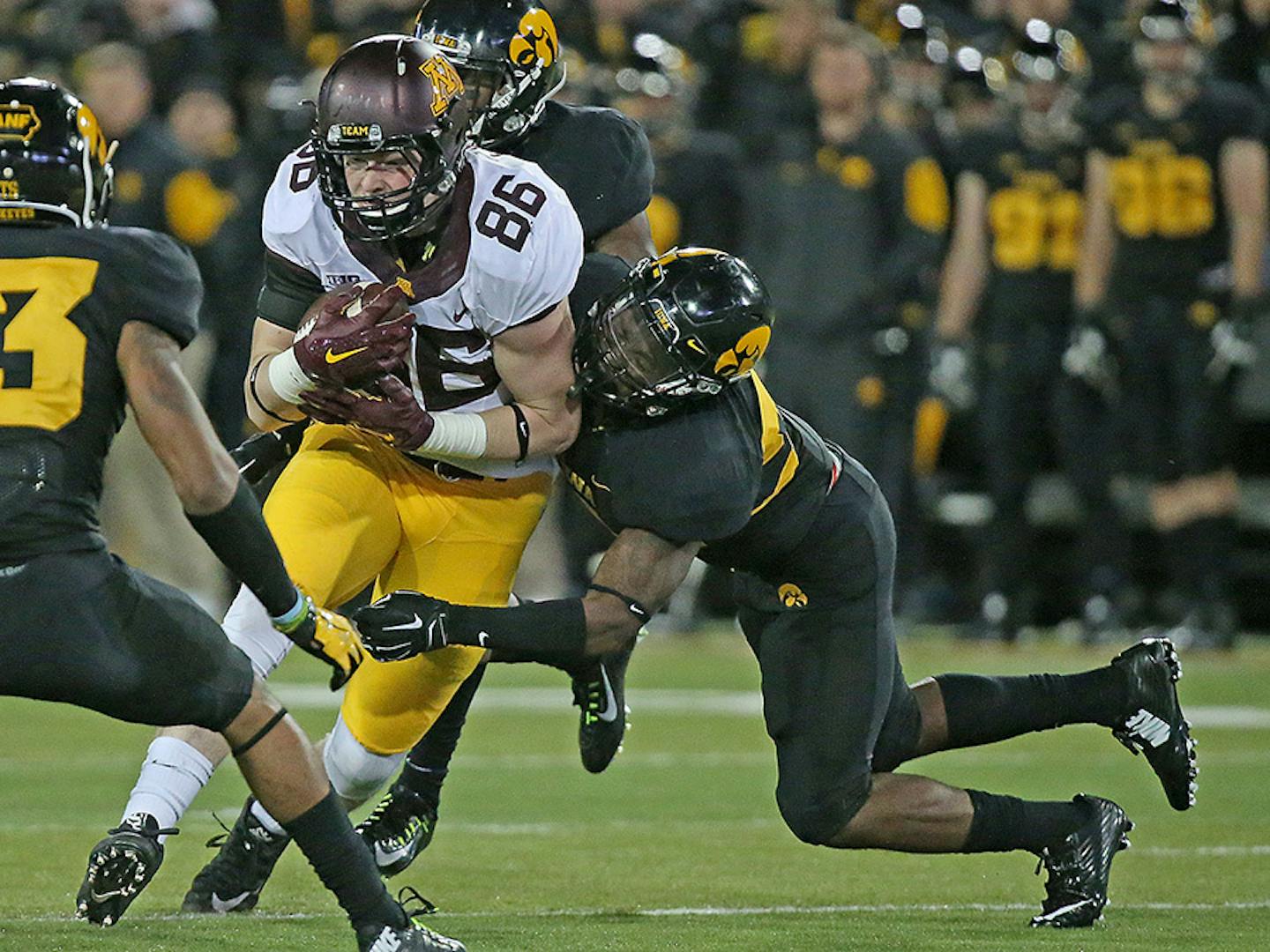 Minnesota's tight end Brandon Lingen plowed through the Iowa defense in the fourth quarter at Kinnick Stadium, Saturday, November 14, 2015 in Iowa City, IA.