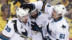 San Jose Sharks' Logan Couture (39) celebrates his goal against the Pittsburgh Penguins with teammates during the first period in Game 5 of the NHL ho
