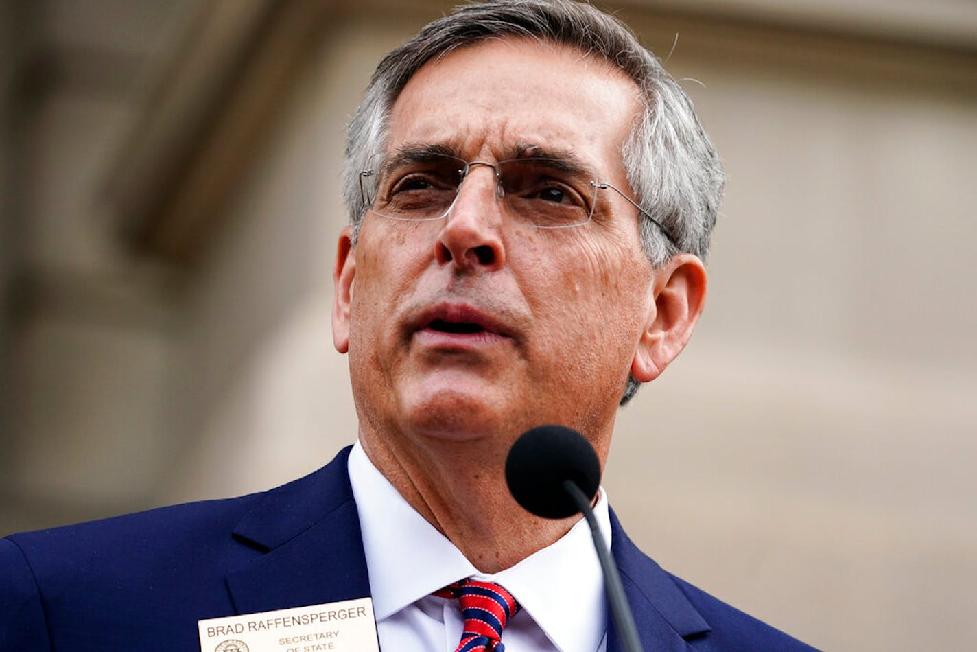 Georgia Secretary of State Brad Raffensperger speaks during a news conference on Wednesday, Nov. 11, 2020, in Atlanta.