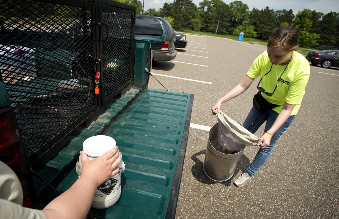 Kara Black captured mosquitos along with other insects around the Andover area that will be counted and compared to historical data for the same locations to get a better idea of how much treatment is necessary. Black used a "sucomatic" designed by an employee of the Metropolitan Mosquito Control District. The battery-powered fan vacuum is run for five minutes in each location, gathering insects in a net. The sample insects are killed and later counted. Tuesday, June 11, 2013 ] GLEN STUBBE * gst