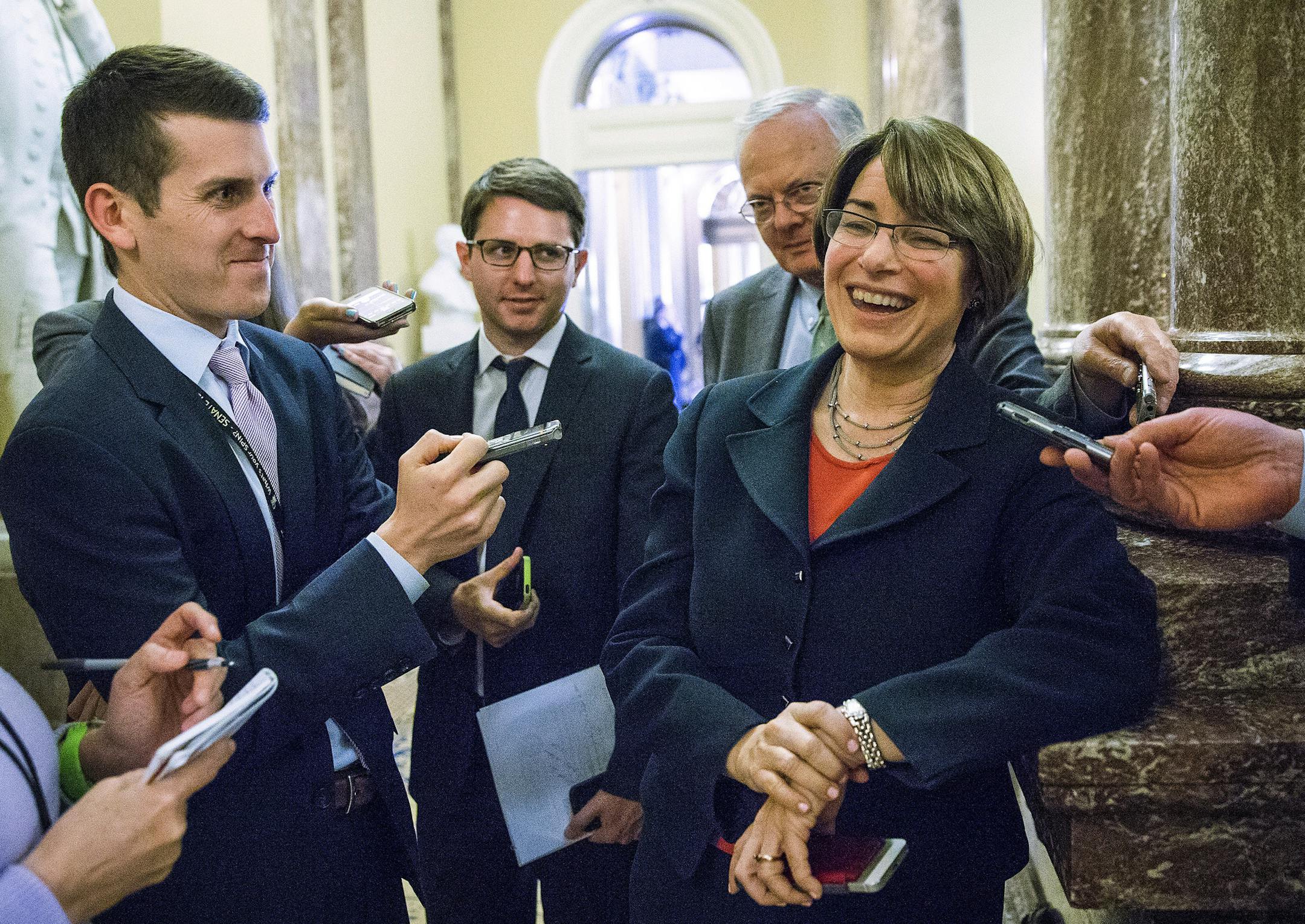 Sen. Amy Klobuchar (D-Minn.) speaks to reporters about a deal that has been reached to resolve a dispute over a sex trafficking bill, at the U.S. Capitol in Washington, April 21, 2015. After weeks of difficult negotiations, the Senate on Tuesday reached an agreement on the bill, paving the way for a confirmation vote on Loretta Lynch to replace Eric Holder as attorney general. ìToday marks a major milestone in our fight against sex trafficking," said Klobuchar. (Doug Mills/The New York Time