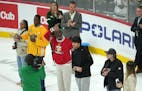 Minnesota Sports Hall of Fame inductees were recognized at the Wild game on April 6. Longtime basketball coach Larry McKenzie waved as the crowd cheer