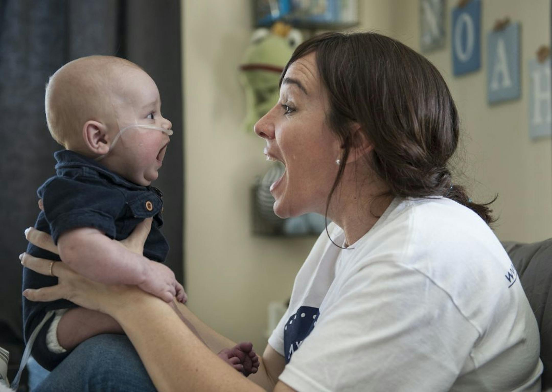 Noah Connally, 5 months, connects with his mother, Niccole Connally, on February 3, 2016. Noah Connally was born with hypoplastic left heart syndrome, which left him with half a heart. His parents are trying to raise funds for the last two of three surgeries that will increase his chances for survival.