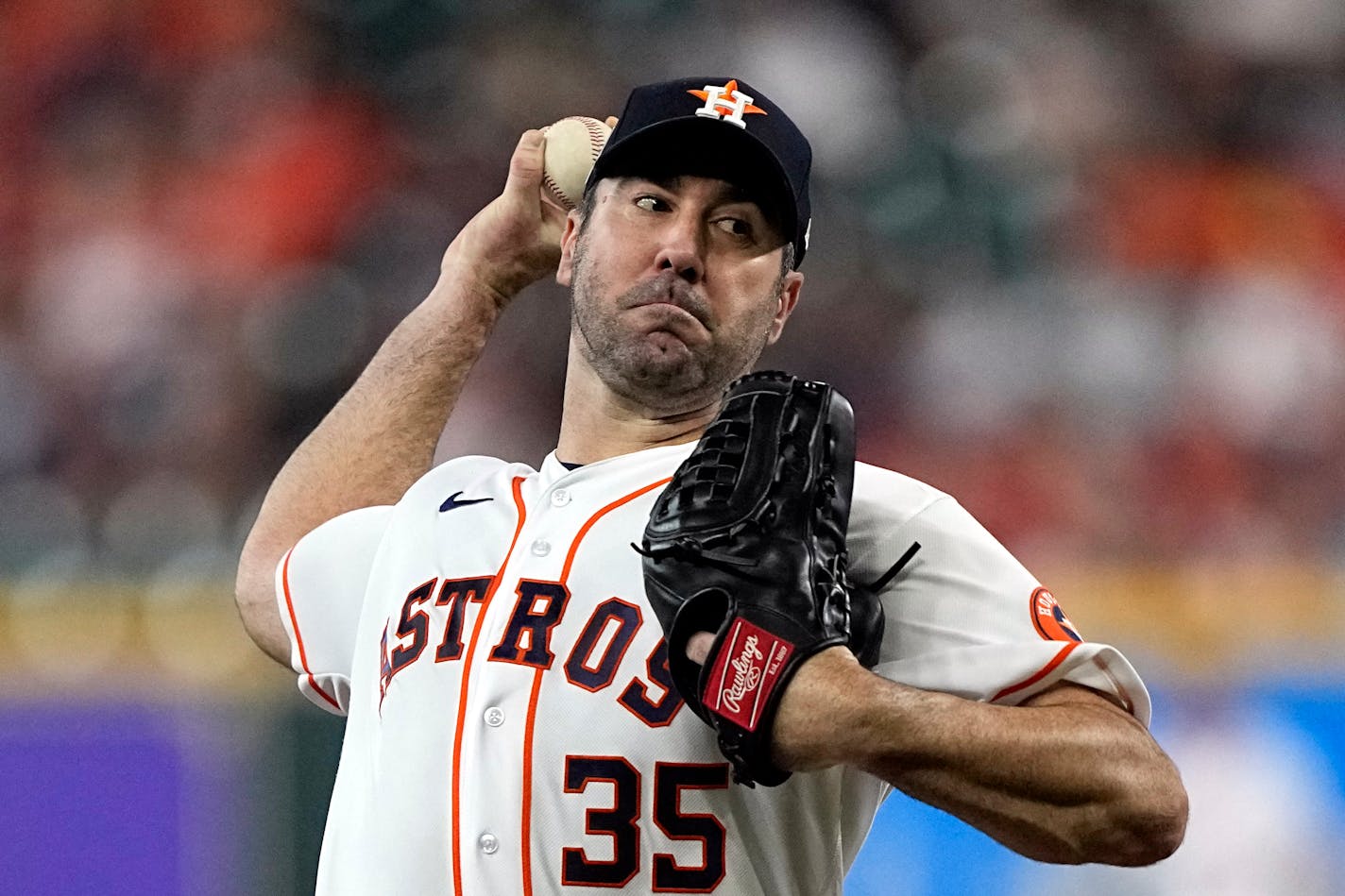 Houston Astros starting pitcher Justin Verlander throws against the Minnesota Twins during the first inning of a baseball game Tuesday, Aug. 23, 2022, in Houston. (AP Photo/David J. Phillip)