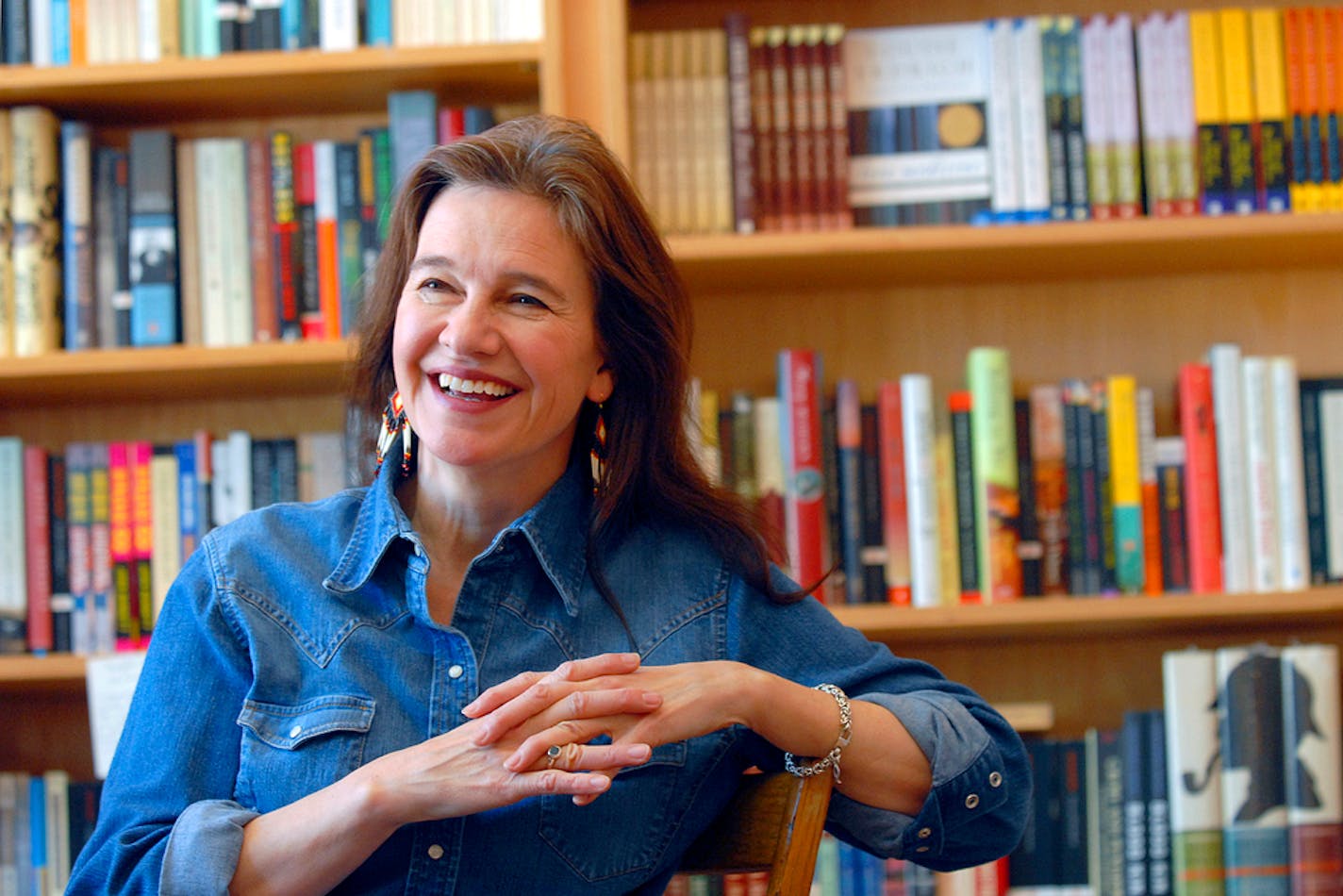 FILE - Author Louise Erdrich reflects on growing up in North Dakota and her new book "The Plague of Doves" at her store BirchBark Books in Minneapolis, Friday, May 16, 2008. The 23rd novel by acclaimed American author Louise Erdrich and an adult fiction debut by Trinidadian stand-up comedian Lisa Allen-Agostini were named finalists on Wednesday, April 27, 2022 for the 30,000 pound ($38,000) Women's Prize for fiction. (AP Photo/Dawn Villella, File)