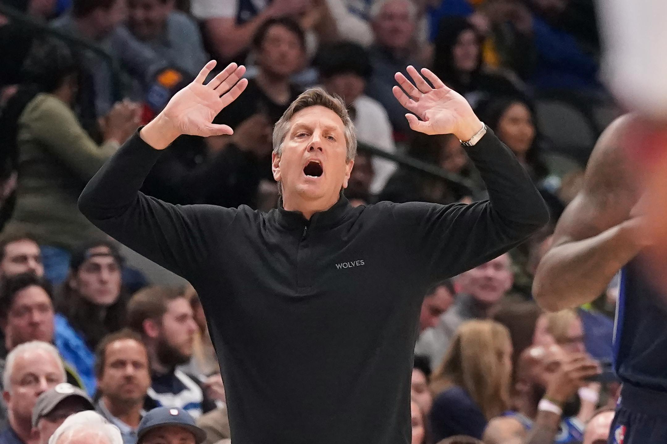 Minnesota Timberwolves head coach Chris Finch yells from the sideline during the first half of an NBA basketball game against the Dallas Mavericks in Dallas, Monday, March 21, 2022. (AP Photo/LM Otero)