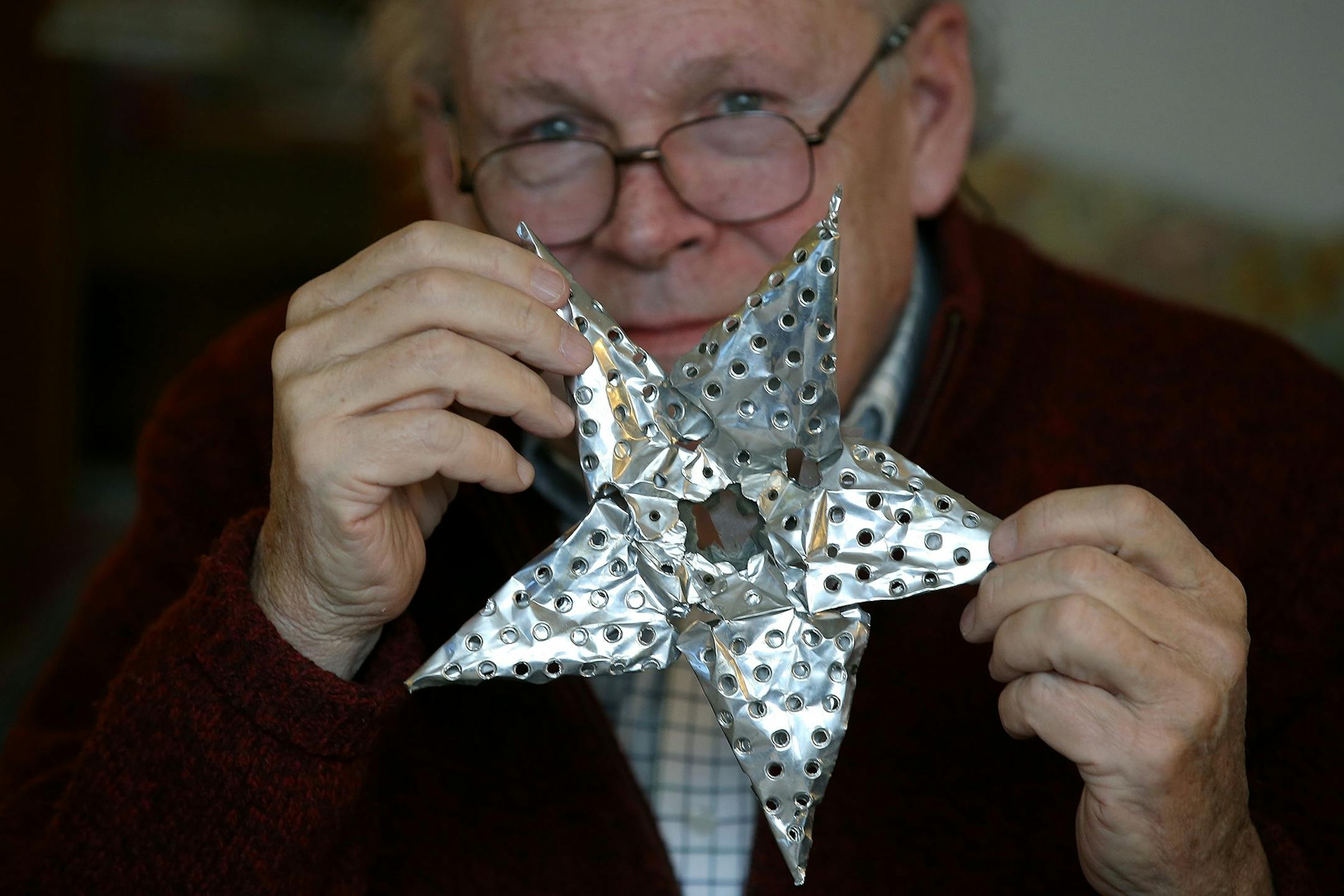 Rob Brown with the star tree topper that his father bought years ago to celebrate his sobriety and the promise of better Christmases.