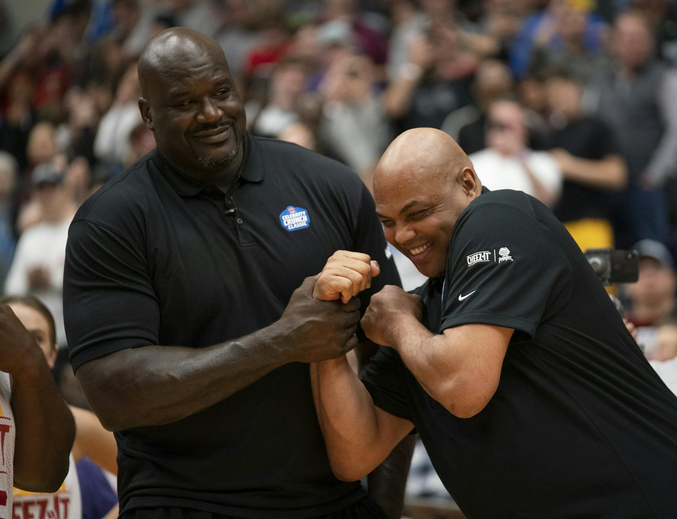 Team Cheeze-It coach Shaquille O'Neal, left, and Team Pringles coach Charles Barkley goofed off during introductions before the game.
