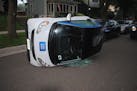 A car2go vehicle that was flpped on its side in St. Paul over the weekend.