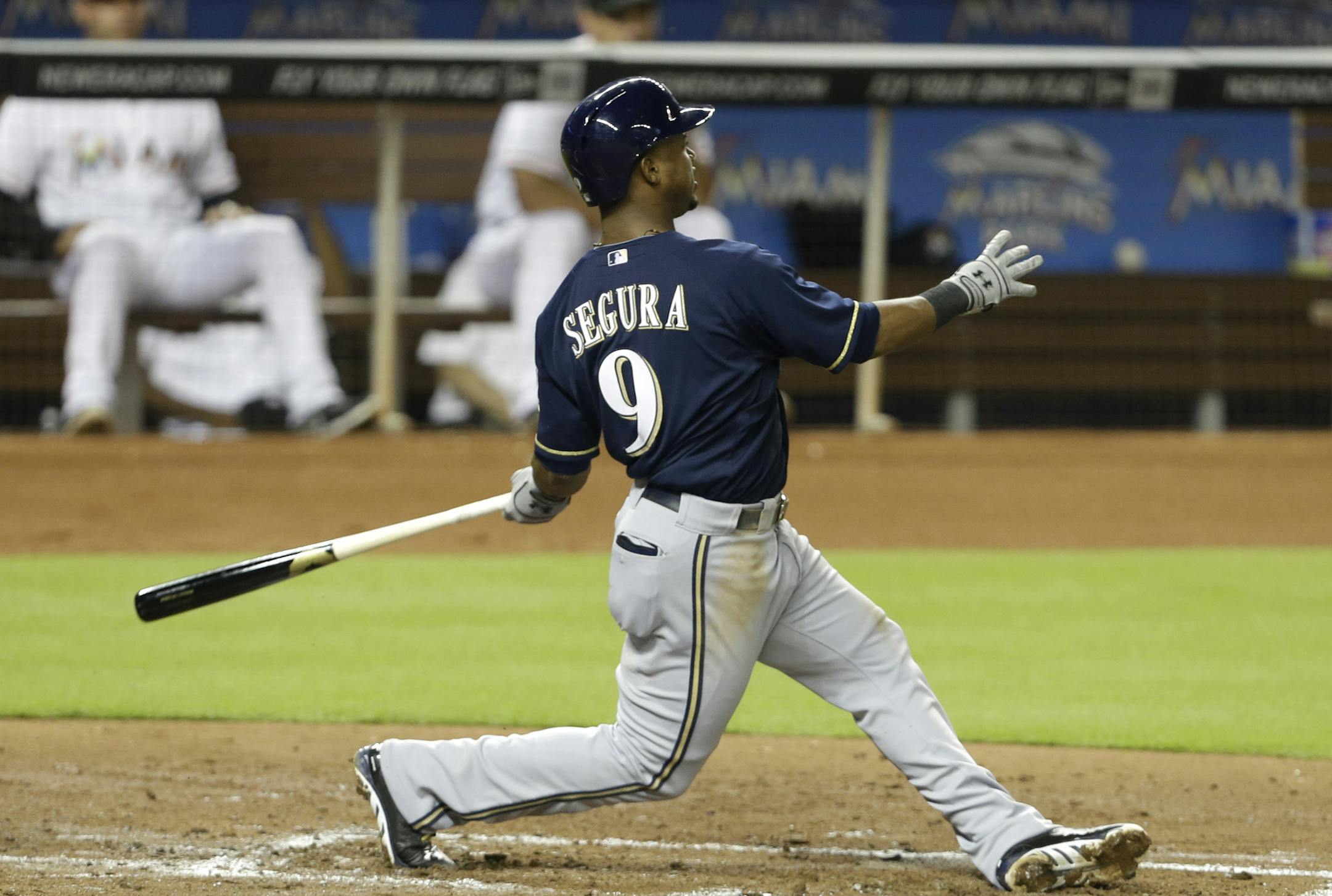 Milwaukee Brewers' Jean Segura (9) bats in the third inning during a baseball game against the Miami Marlins in Miami, Tuesday, June 11, 2013. (AP Photo/Lynne Sladky)