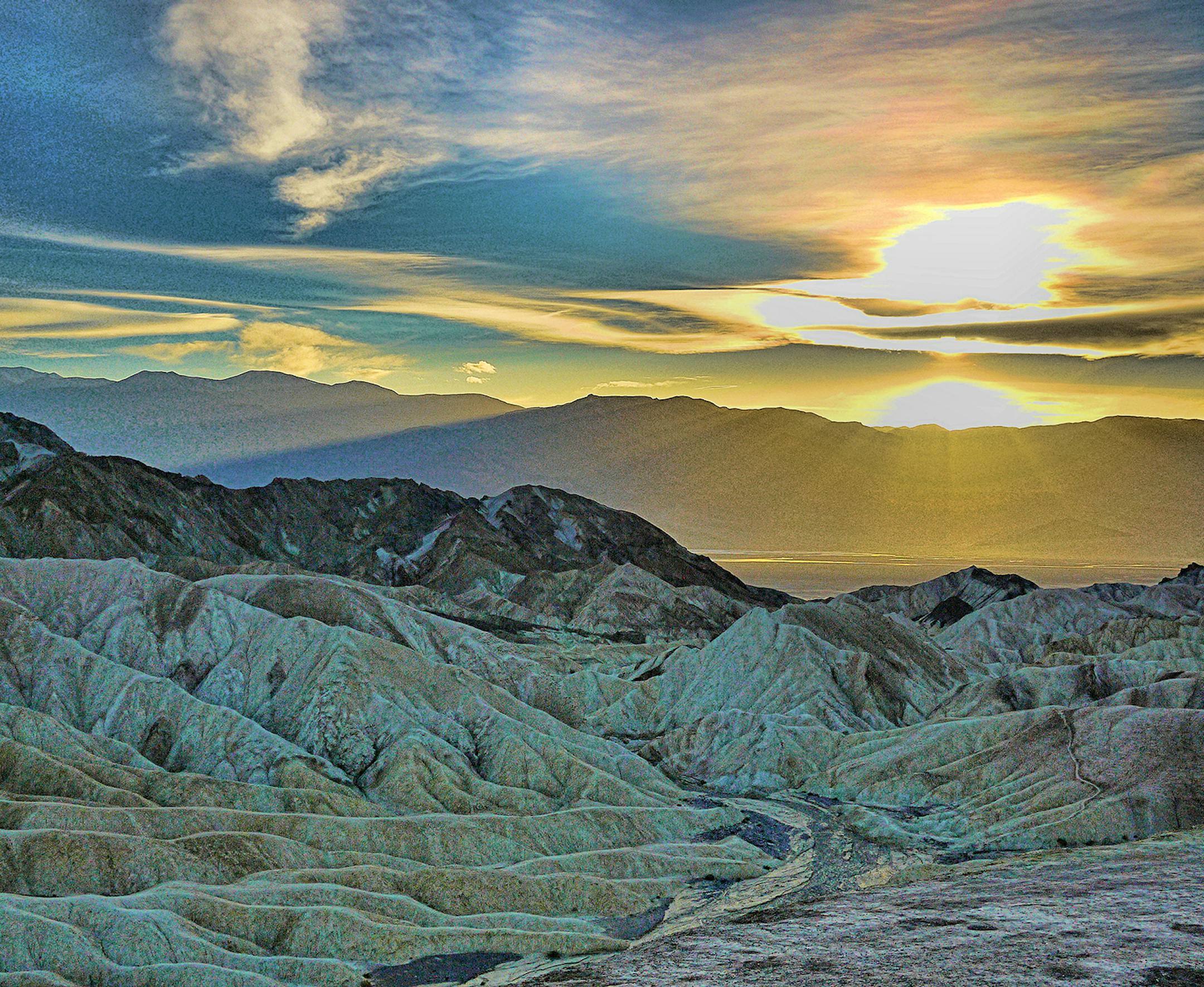In early March we traveled to Death Valley National Park for a late winter getaway and to see the "super bloom" that resulted from last fall's rains. We had a wonderful three days in and around Death Valley and thoroughly enjoyed the desert in bloom. February and March are a wonderful time for hiking and exploring in the area. Death Valley National Park is the largest national park in the lower 48 states and it contains and is surrounded by a wide variety of geographic features - from salt flats