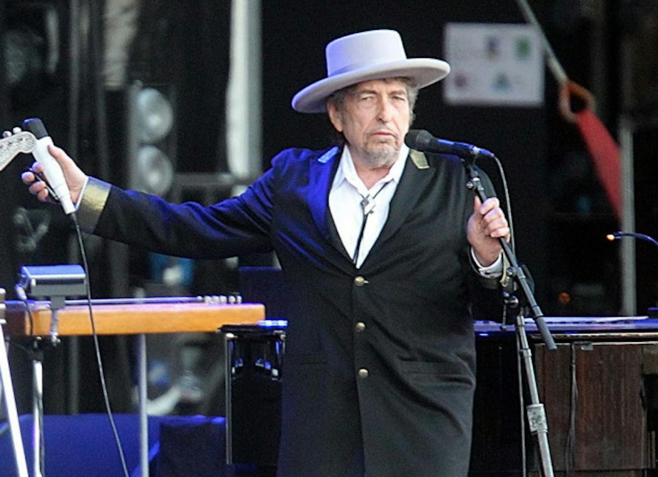 Bob Dylan, shown in France this summer, stood and swaggered for a handful of the songs Wednesday at Xcel Energy Center. / AP Photo, David Vincent