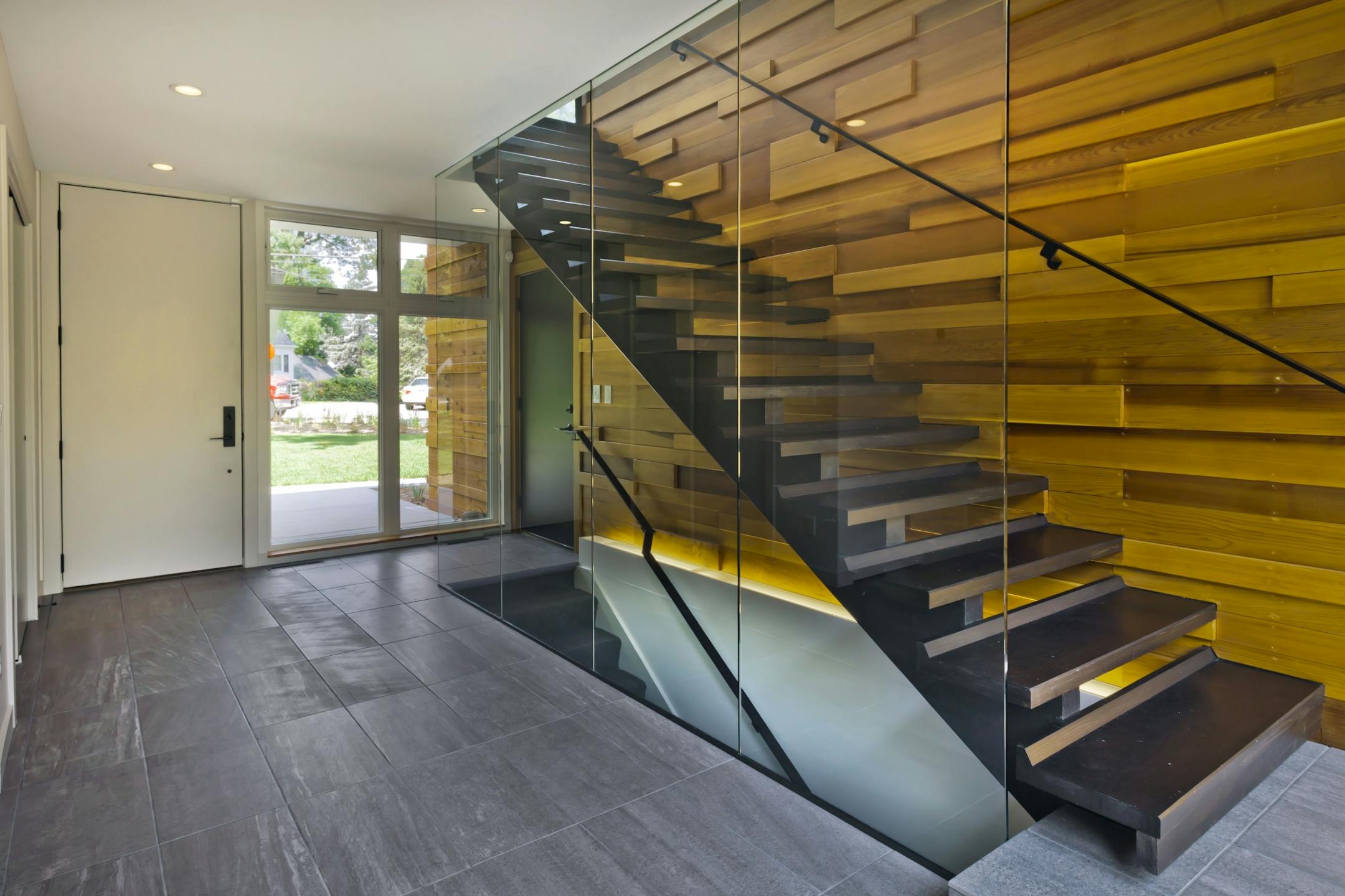 Home of he Month: RoehrSchmitt Architecture translated the best features of a family's downtown loft into a new modern home . Credit Gilbertson Photography