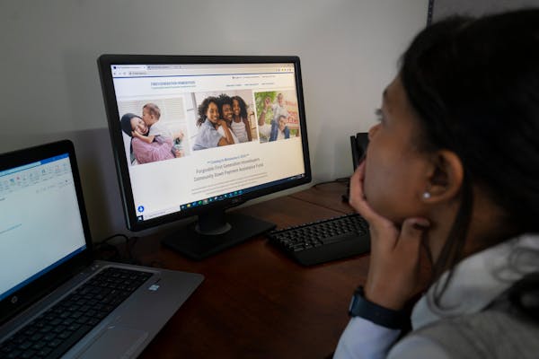 Theressa Ruiz, program manager at homeownership counseling center PRG Inc., looked at a first-generation housing assistance website to be launched nex