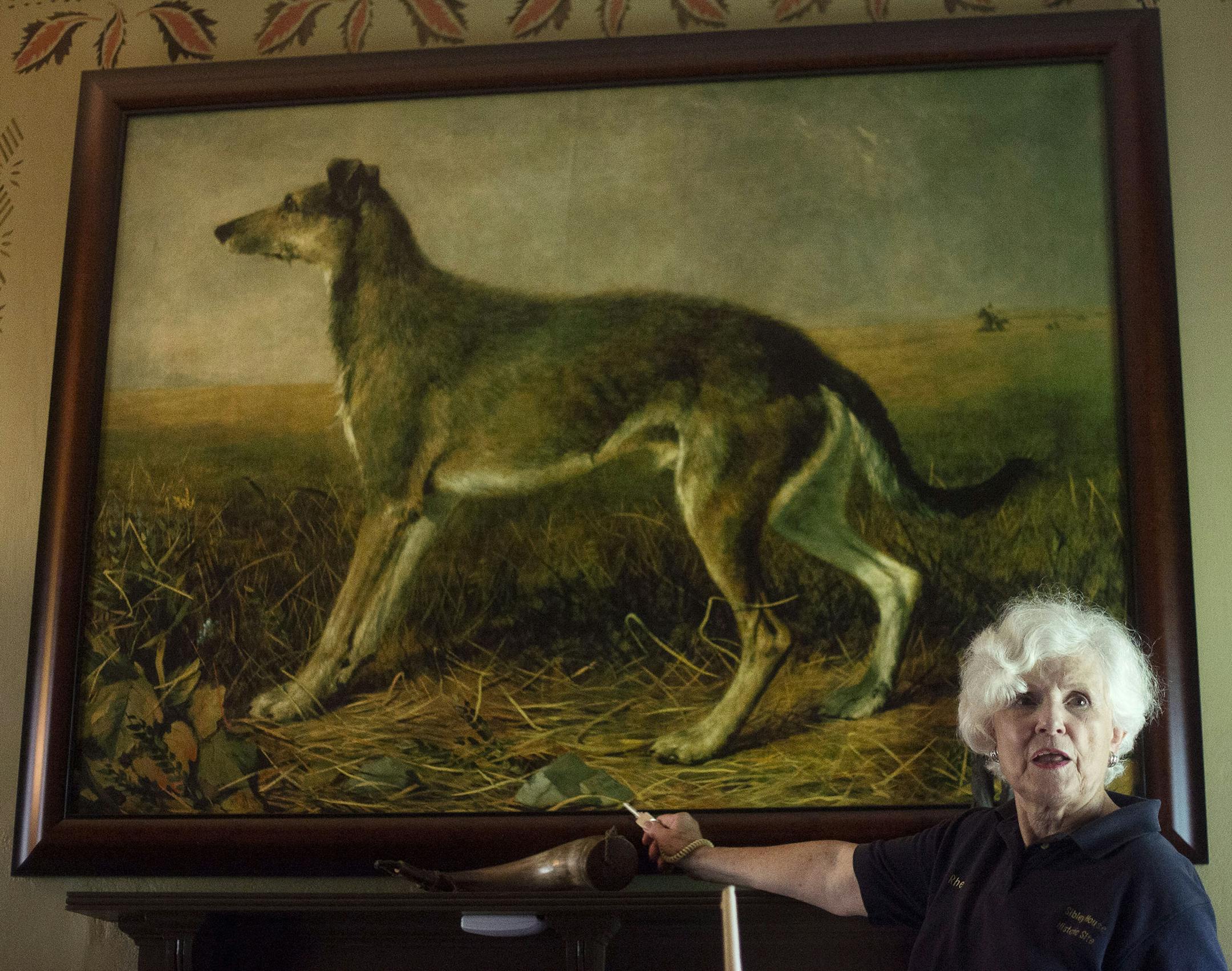 Tour guide Rhea Nyquist, of St. Paul, pointed to a painting in the Henry Sibley House during the tour on the life and career of Henry Sibley, Minnesota's first governor, at the Sibley Historic Site, in Mendota Heights, Minn. on Saturday August 8, 2015. ] RACHEL WOOLF · rachel.woolf@startribune.com
