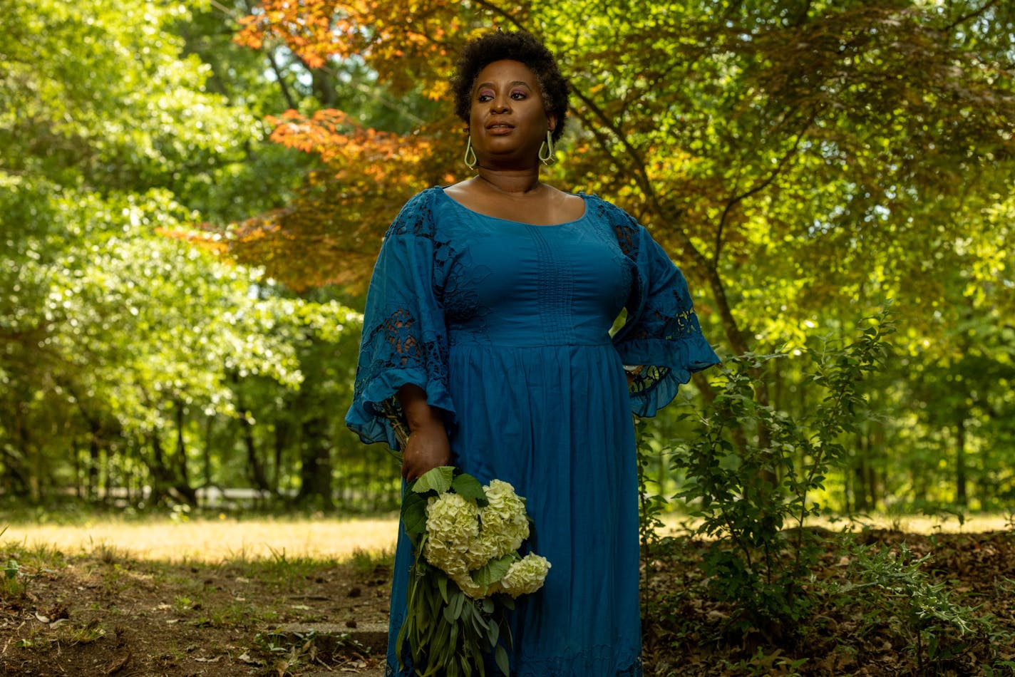 Nicole A. Taylor, author of "Watermelon and Red Birds," on her property in Athens, Ga. MUST CREDIT: Photo by Lynsey Weatherspoon for The Washington Post.