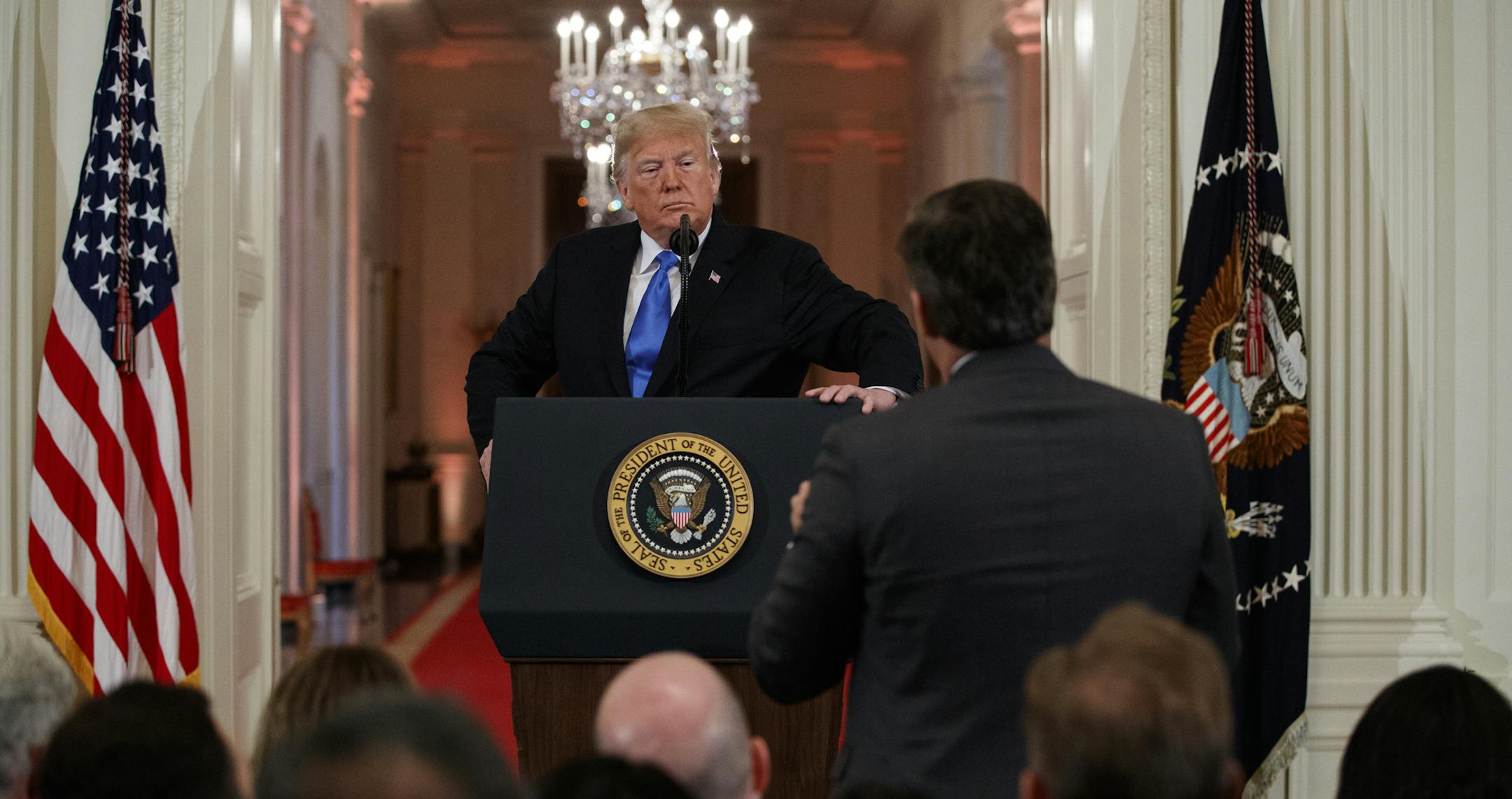 President Donald Trump listens to a question from CNN journalist Jim Acosta during a news conference in the East Room of the White House, Wednesday, Nov. 7, 2018, in Washington. (AP Photo/Evan Vucci)