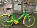 A LimeBike dockless bike. A solar panel in the basket powers the lock. Lime Bike is vying for TC bike-share market.