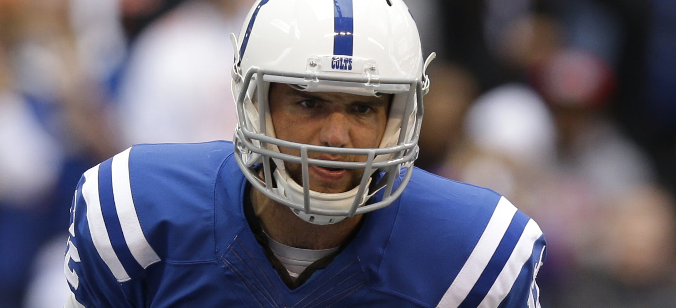 Indianapolis Colts quarterback Andrew Luck (12) calls a play during the first half of an NFL football game against the Cincinnati Bengals Sunday, Oct. 19, 2014, in Indianapolis. (AP Photo/Michael Conroy)