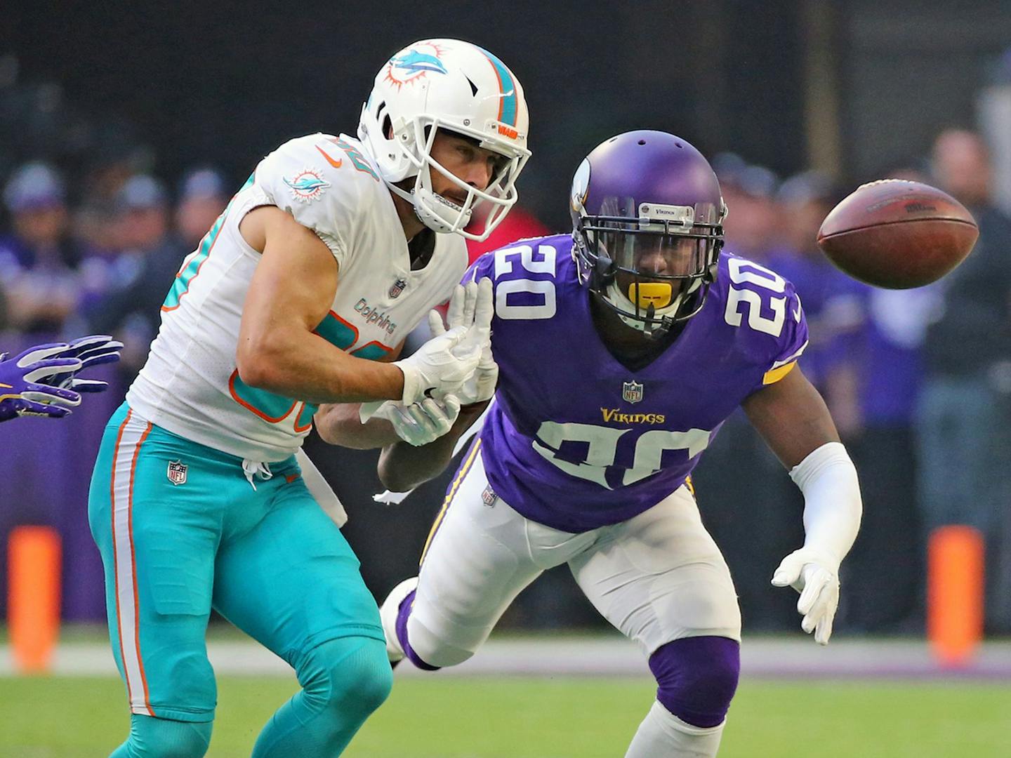 Miami Dolphins receiver Danny Amendola (80) misses a pass in the first quarter as he is defended by Minnesota Vikings Mackensie Alexander (20) on Sunday, Dec. 16, 2018 at U.S. Bank Stadium in Minneapolis, Minn. (Charles Trainor Jr./Miami Herald/TNS)