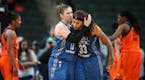 Minnesota Lynx guard Lindsay Whalen (13) left and Seimone Augustus (33) celebrated a 80- 78 win over Connecticut at Xcel Energy Center May 22, 2017 in