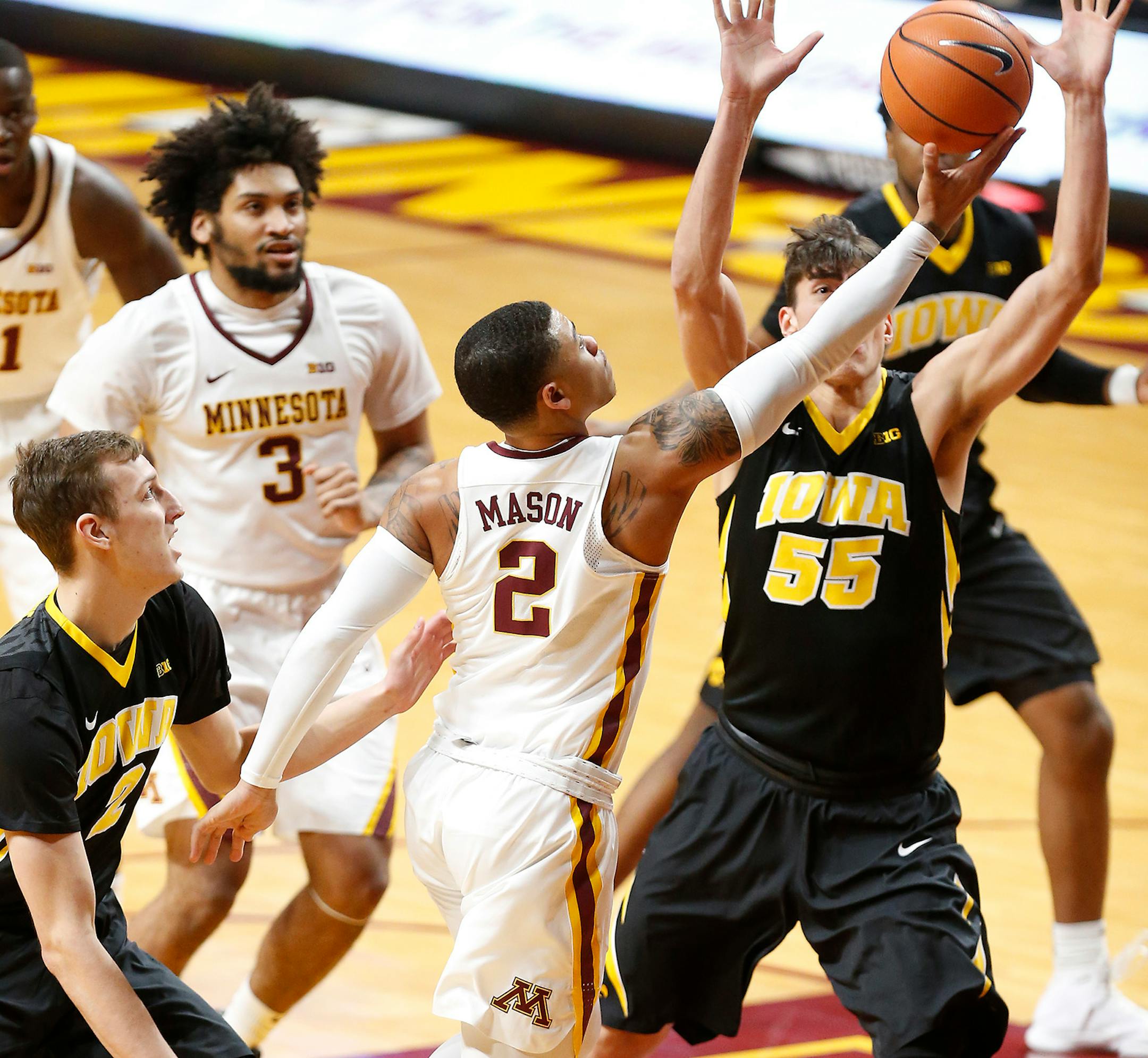 Minnesota's Nate Mason shoots during the first half against Iowa at Williams Arena on Wednesday.