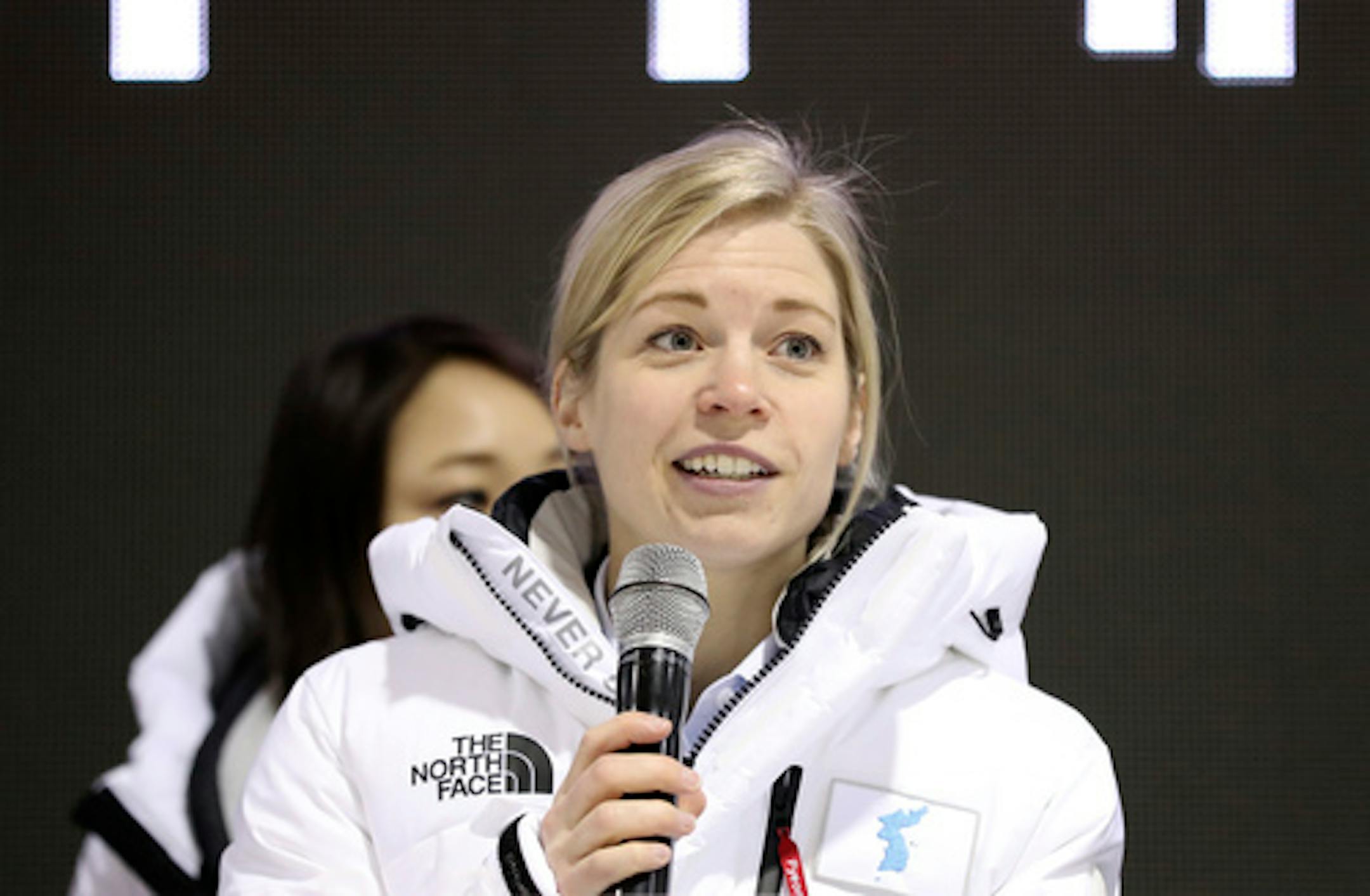 Sarah Murray, one of the coaches of the combined Koreas team answers a reporter's question after the practice match between the combined Koreas team and Sweden prior to the 2018 Winter Olympics in Incheon, South Korea, Sunday, Feb. 4, 2018. (AP Photo/Lee Jin-man)