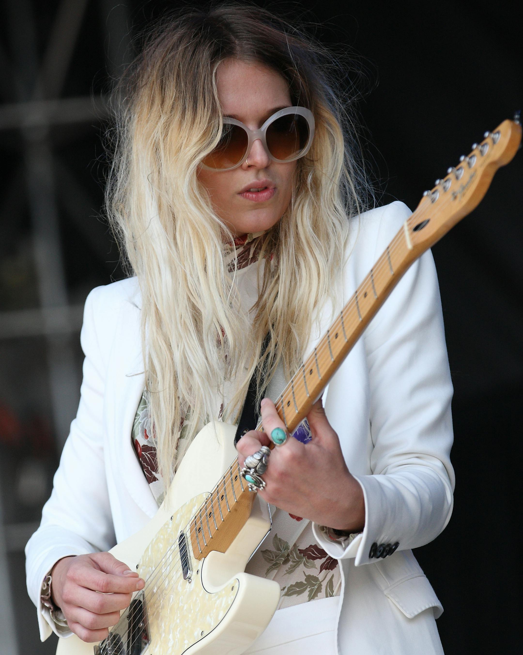 Natalie Bergman of the band Wild Belles performs on day 3 of Lollapalooza 2013 at Grant Park on Sunday, Aug. 4, 2013, in Chicago. (Photo by Steve Mitchell/Invision/AP) ORG XMIT: MIN2013091015485787