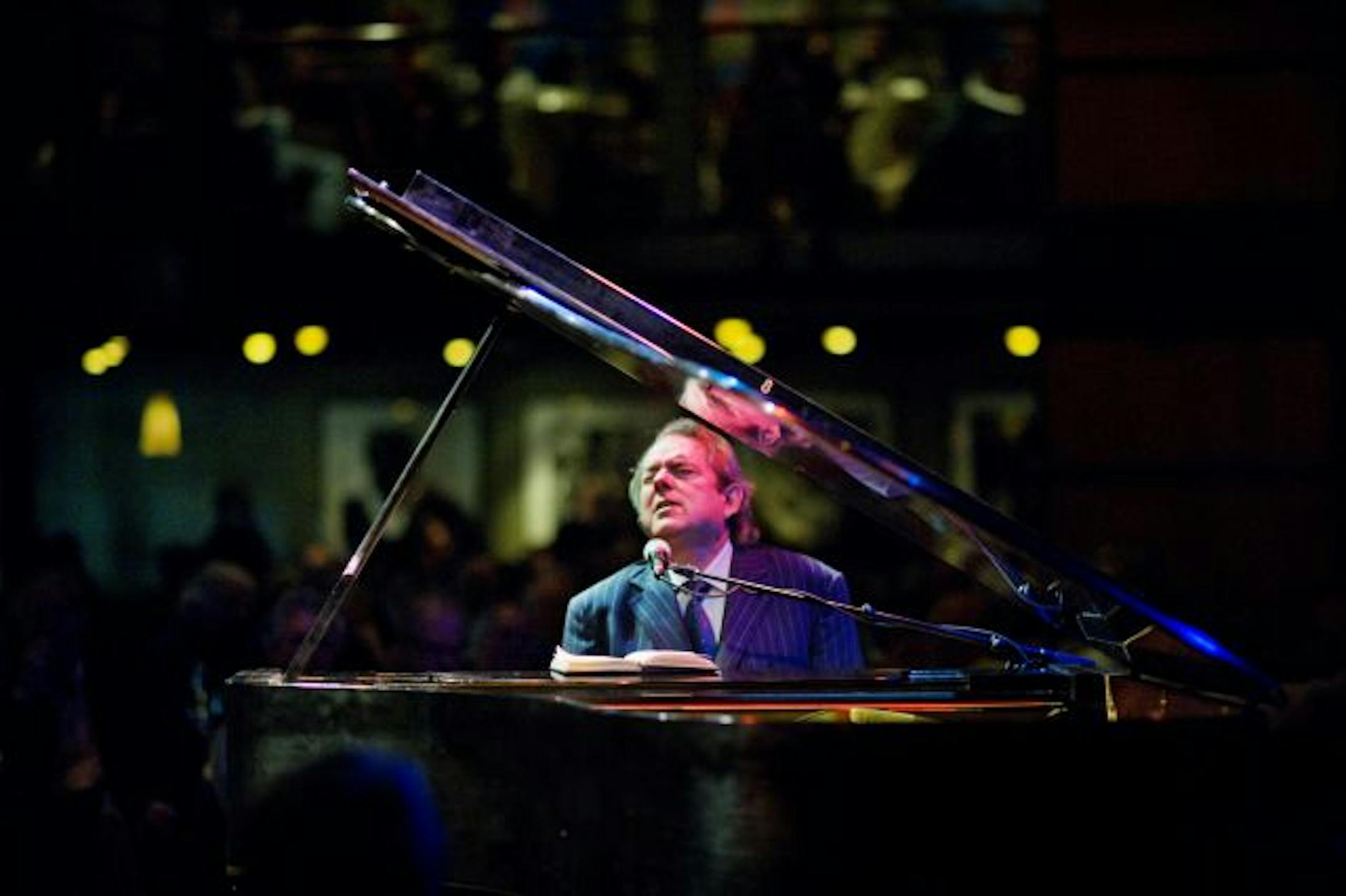 Legendary pop songwriter Jimmy Webb sang his classic songs at the piano Sunday night at the Dakota Jazz Club.