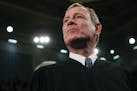 In this Tuesday, Feb. 4, 2020, photo, Supreme Court Chief Justice John Roberts arrives before President Donald Trump delivers his State of the Union a
