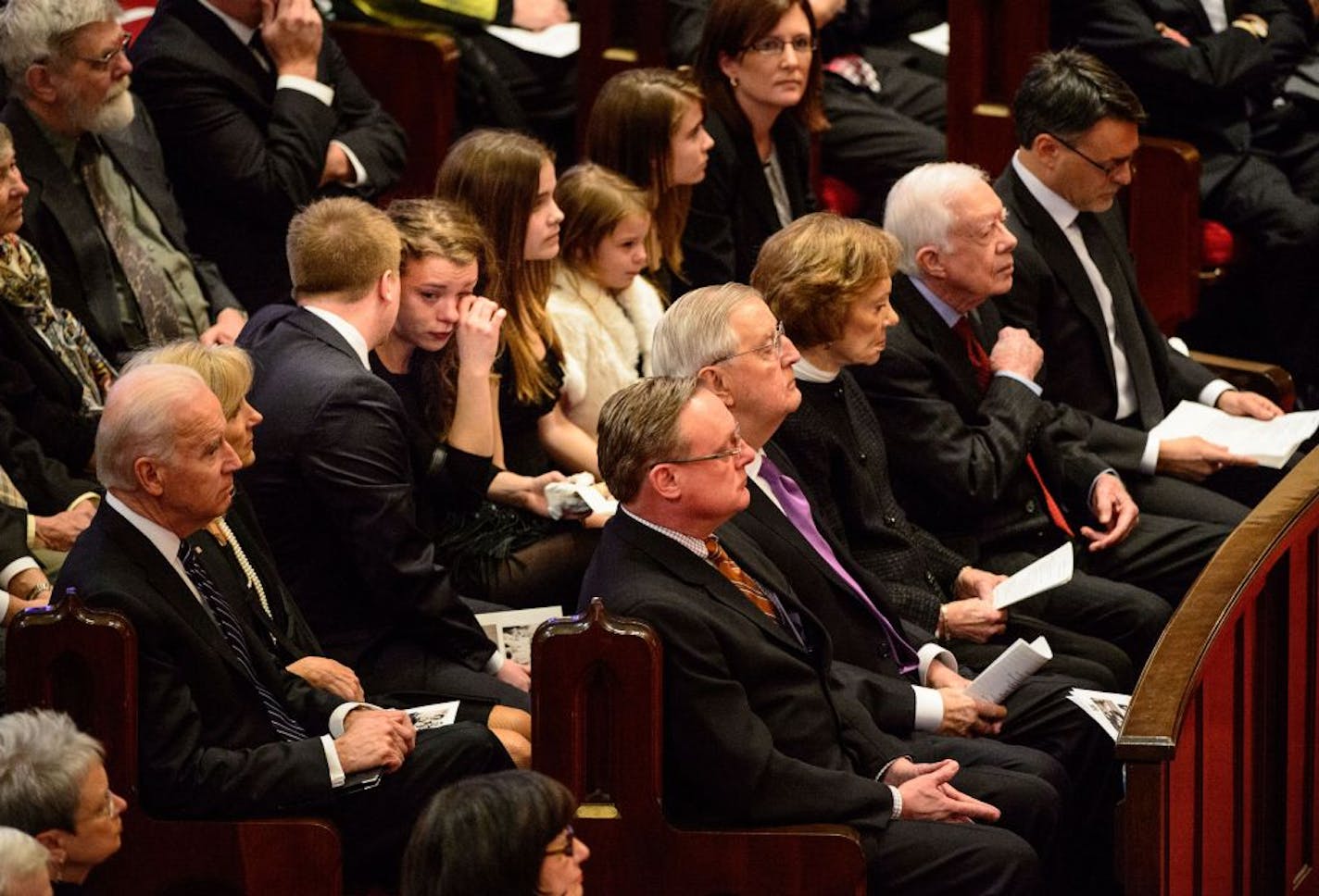 Front row from left, Ted Mondale, Walter Mondale, Rosalynn and Jimmy Carter and William Mondale. Vice President Joe Biden and wife Jill are seated behind the Mondales. Joan Mondale's memorial service was held Saturday, February 8, 2014 at Westminster Presbyterian Church, Minneapolis. Vice President Joe Biden attended with his wife Jill as well as Jimmy and Rosalynn Carter.