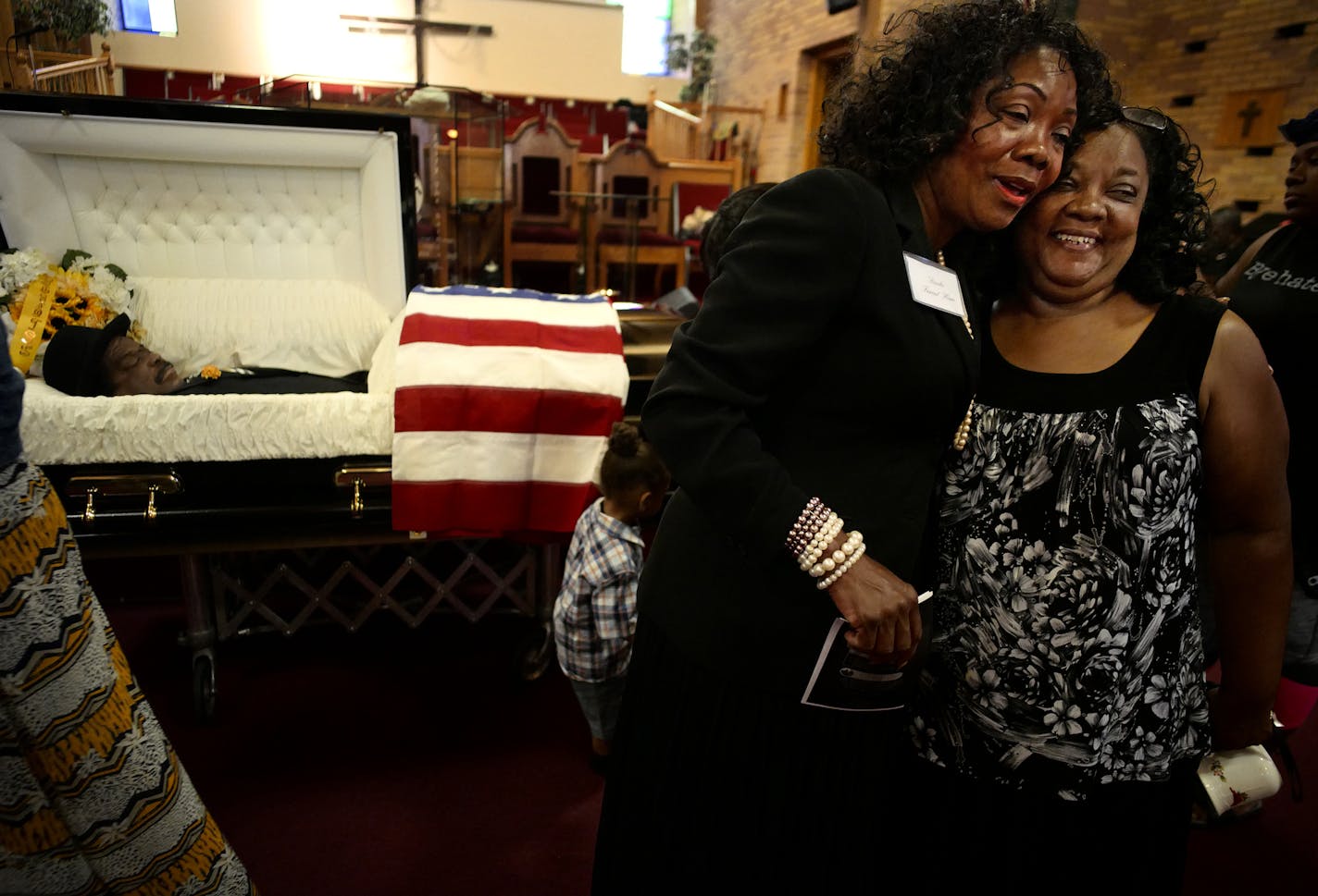 At Herman Walker's funeral at New Hope Baptist, Margaret Brooks hugged Faye Tredwell.]Since opening in 1941, Brooks Funeral Home in St. Paul has become a trusted fixture in the black community. Margaret Brooks runs the home with her husband, George and several of the sons. Richard Tsong-taatarii@startribune.com