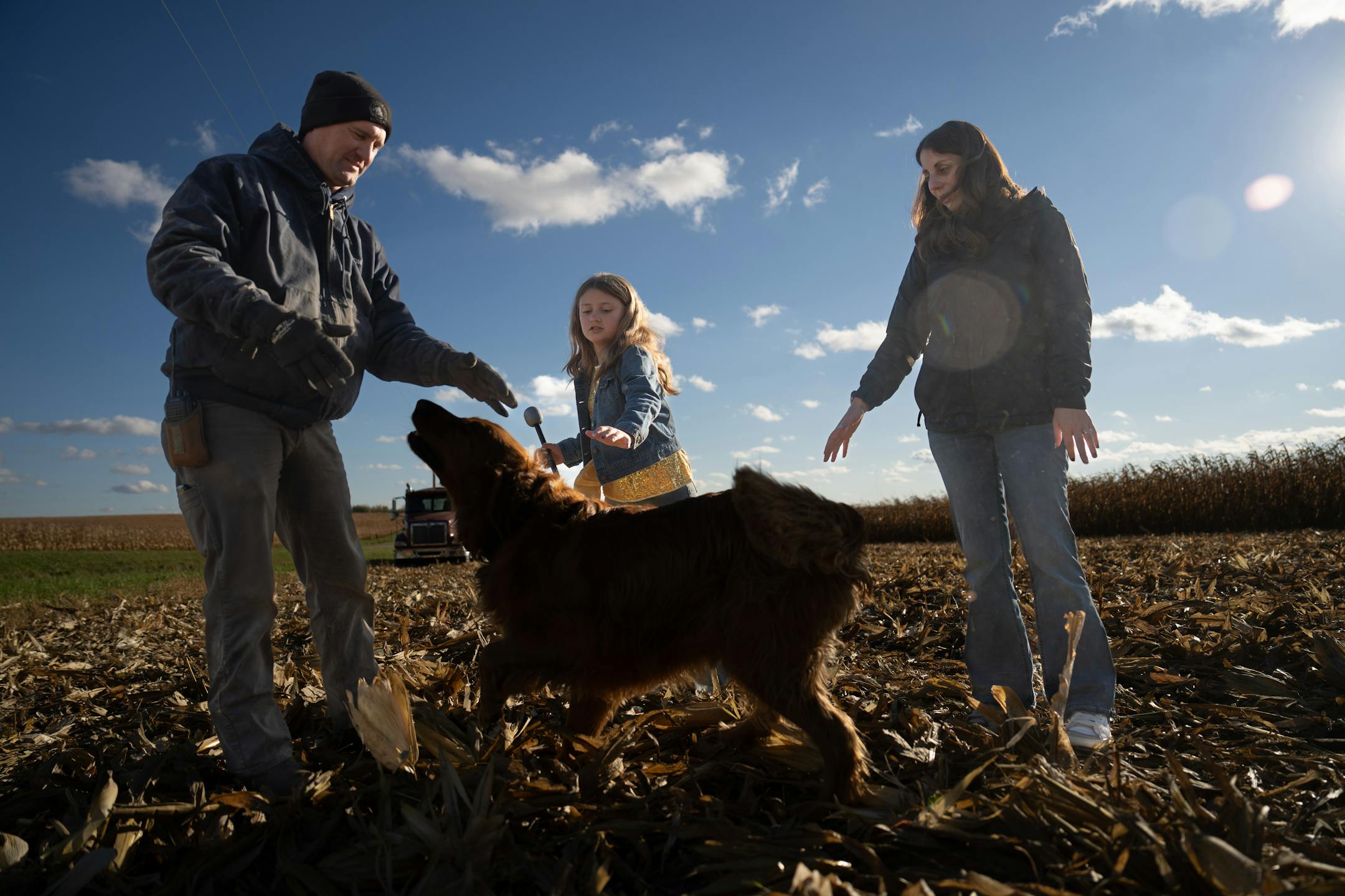 Ben Johnson takes a break from harvesting as daughter Ellie Johnson shows off her Abba Halloween costume as her mom Merideth and dog Parker look on, during the 2025 harvest. 
Wednesday October 22, 2025 

Glen Stubbe for The Minnesota Star Tribune