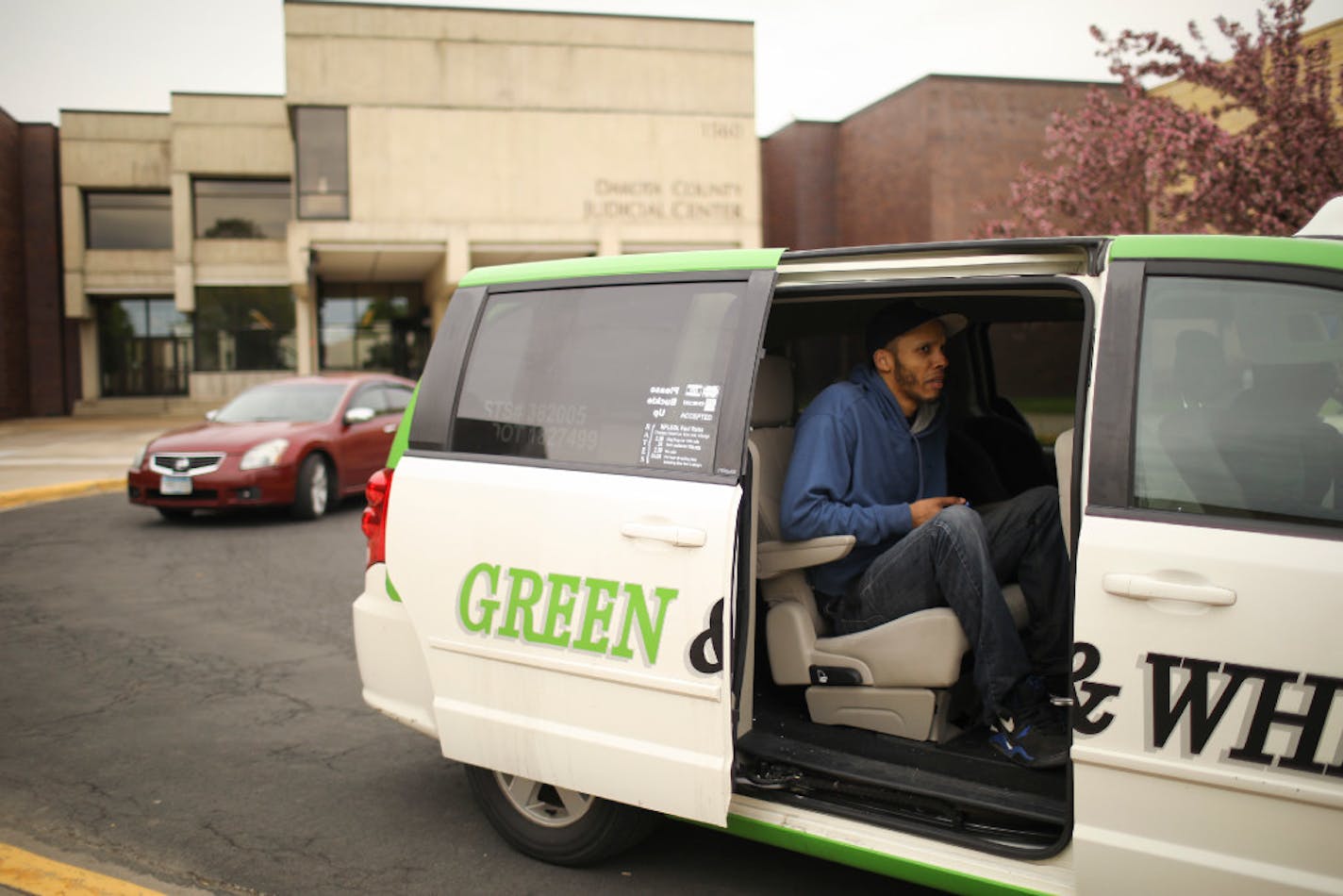 After being released from the Dakota County jail Wednesday afternoon, Damien Ogboola sat in a cab and decided on his options after being told the fare to the Apple Valley transit station would be $50 and he only had $30. He thanked the driver and let the cab go.