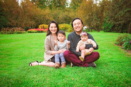Psychologist Ia Xiong, left, pictured with her husband, Phineas Vang, 3-year-old son Koda, and 1-year-old daughter Shayla.