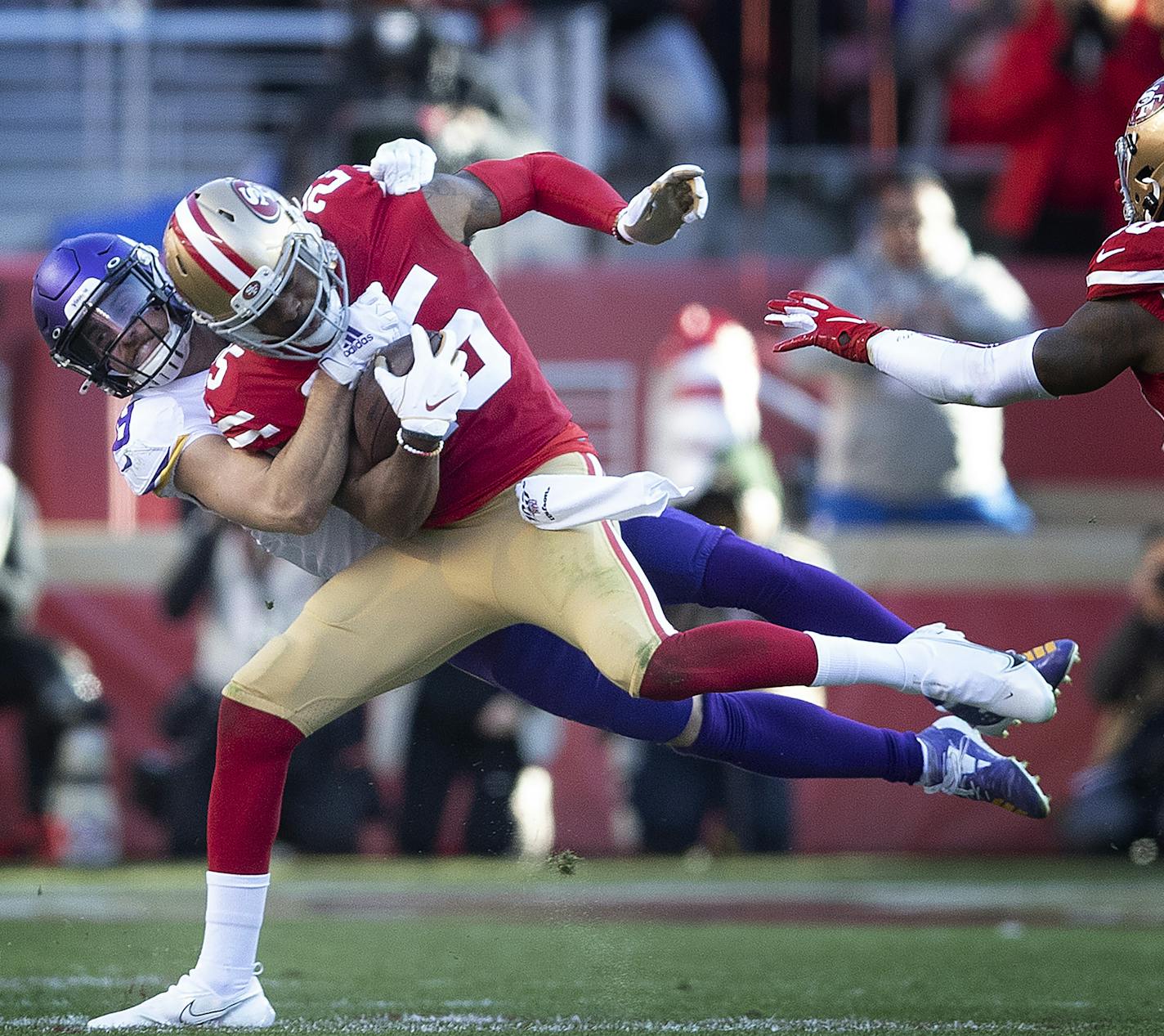 Minnesota Vikings wide receiver Adam Thielen (19) tackled San Francisco 49ers cornerback Richard Sherman (25) after he intercepted at third quarter pass .] Jerry Holt &#x2022; Jerry.Holt@startribune.com The Minnesota Vikings played the San Francisco 49ers in the NFC divisional playoff NFL football game Saturday, January 11, 2020 at Levi's Stadium in Santa Clara,CA.