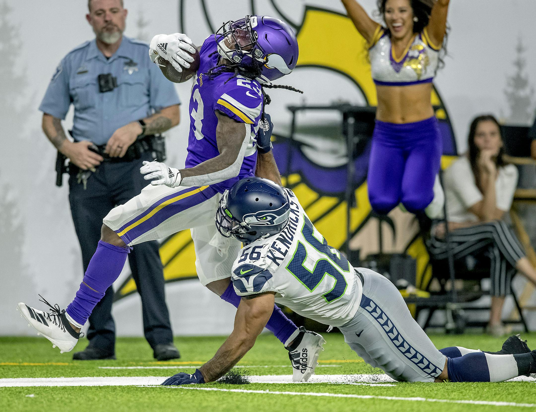 Vikings running back Mike Boone ran for 45 yards before being stopped by Seahawks' linebacker Mychal Kendricks during the second quarter of the pre-season matchup between the Minnesota Vikings and the Seattle Seahawks at US Bank Stadium, Sunday, August 18, 2019 in Minneapolis, MN. ] ELIZABETH FLORES &#x2022; liz.flores@startribune.com