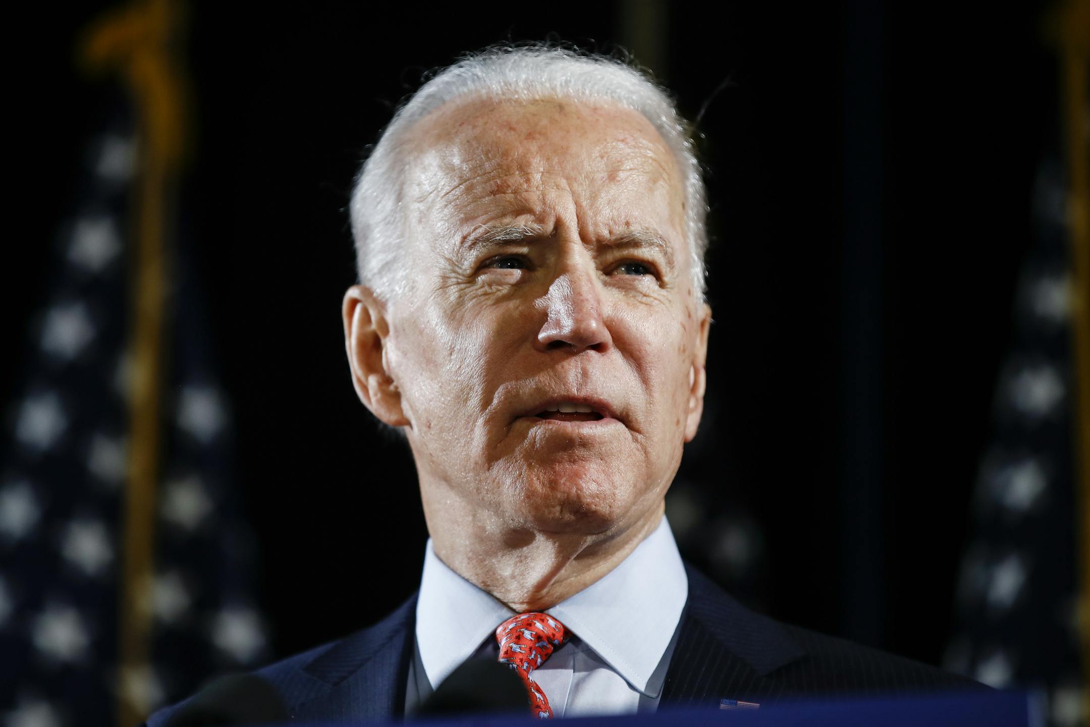 FILE - In this March 12, 2020, file photo, Democratic presidential candidate former Vice President Joe Biden speaks in Wilmington, Del. Alaska Democrats are deciding their choice for the party's presidential nominee, as just one major candidate, Biden, remains actively campaigning. Results are expected Saturday, April 11, in the party-run primary, which became an exclusively vote-by-mail affair after concerns with COVID-19 scrapped plans for in-person voting sites and pushed back the original pr