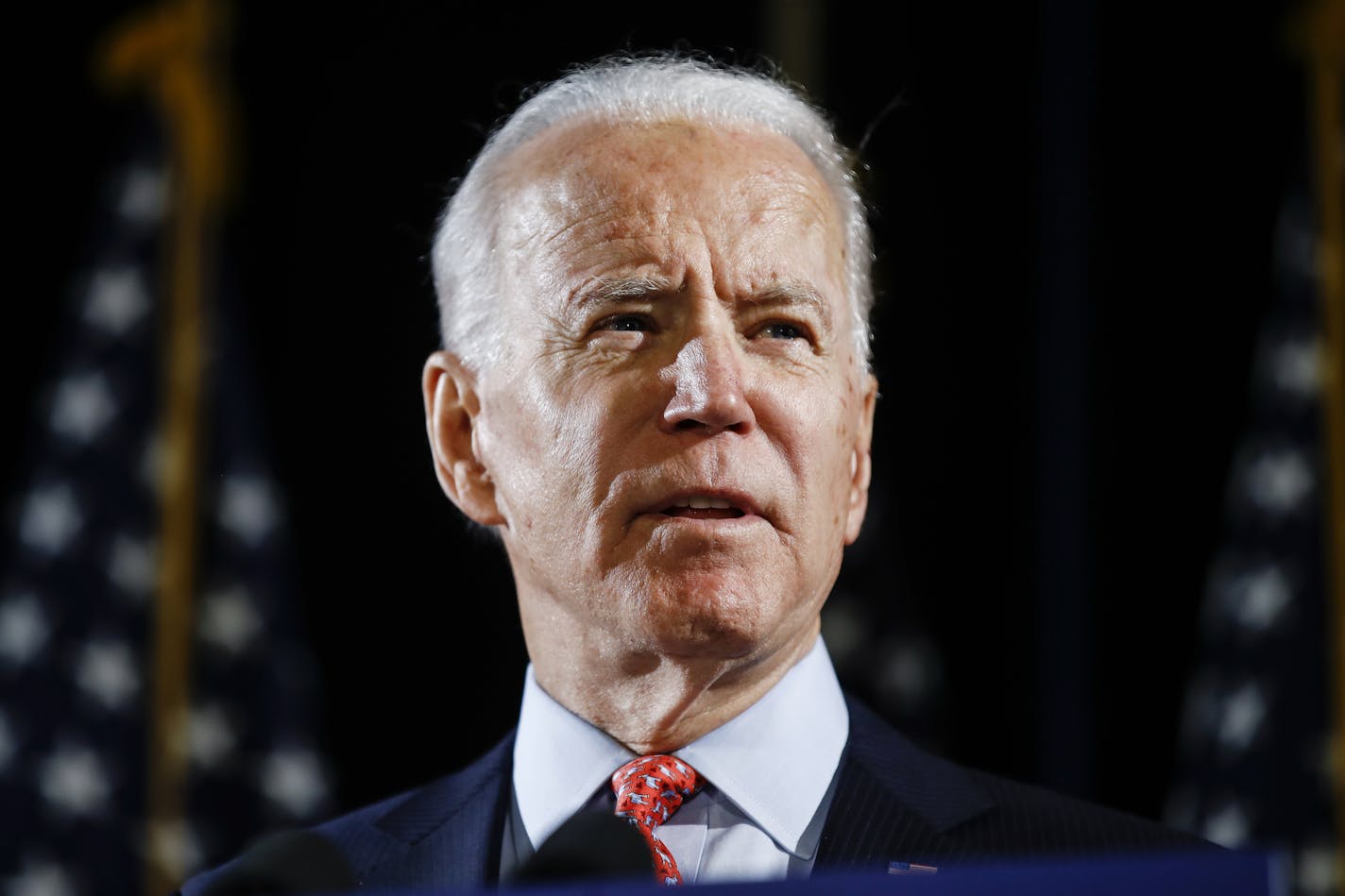 FILE - In this March 12, 2020, file photo, Democratic presidential candidate former Vice President Joe Biden speaks in Wilmington, Del. Alaska Democrats are deciding their choice for the party's presidential nominee, as just one major candidate, Biden, remains actively campaigning. Results are expected Saturday, April 11, in the party-run primary, which became an exclusively vote-by-mail affair after concerns with COVID-19 scrapped plans for in-person voting sites and pushed back the original pr