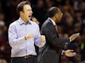 Gophers coach Richard Pitino reacted at the end of regulation. Minnesota beat Iowa 101-89 in double overtime.