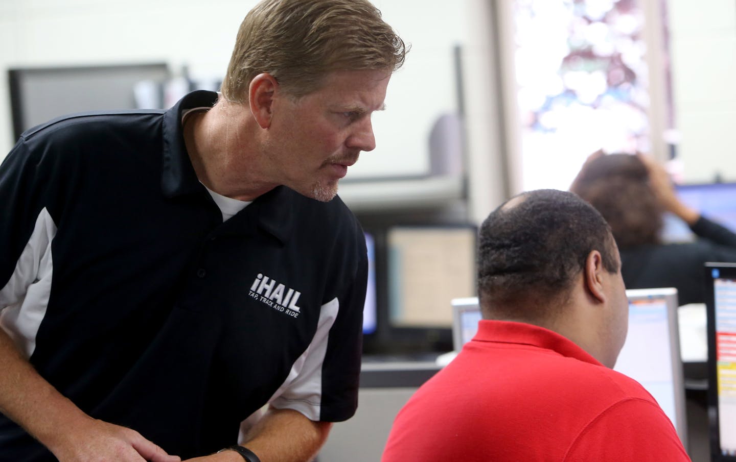 iHail is a new consortium of cab companies joining together under Taxi Services Inc. to combat the ride-sharing economy, including global giant, Uber. Here, Steve Pint, president and CEO of Taxi Services Inc. in the company's communication center Thursday, Aug. 6, 2014, in New Hope, MN.](DAVID JOLES/STARTRIBUNE)djoles@startribune.com iHail is a new consortium of cab companies joining together under Taxi Services Inc. to combat the ride-sharing economy, including global giant, Uber.** Steve Pint,