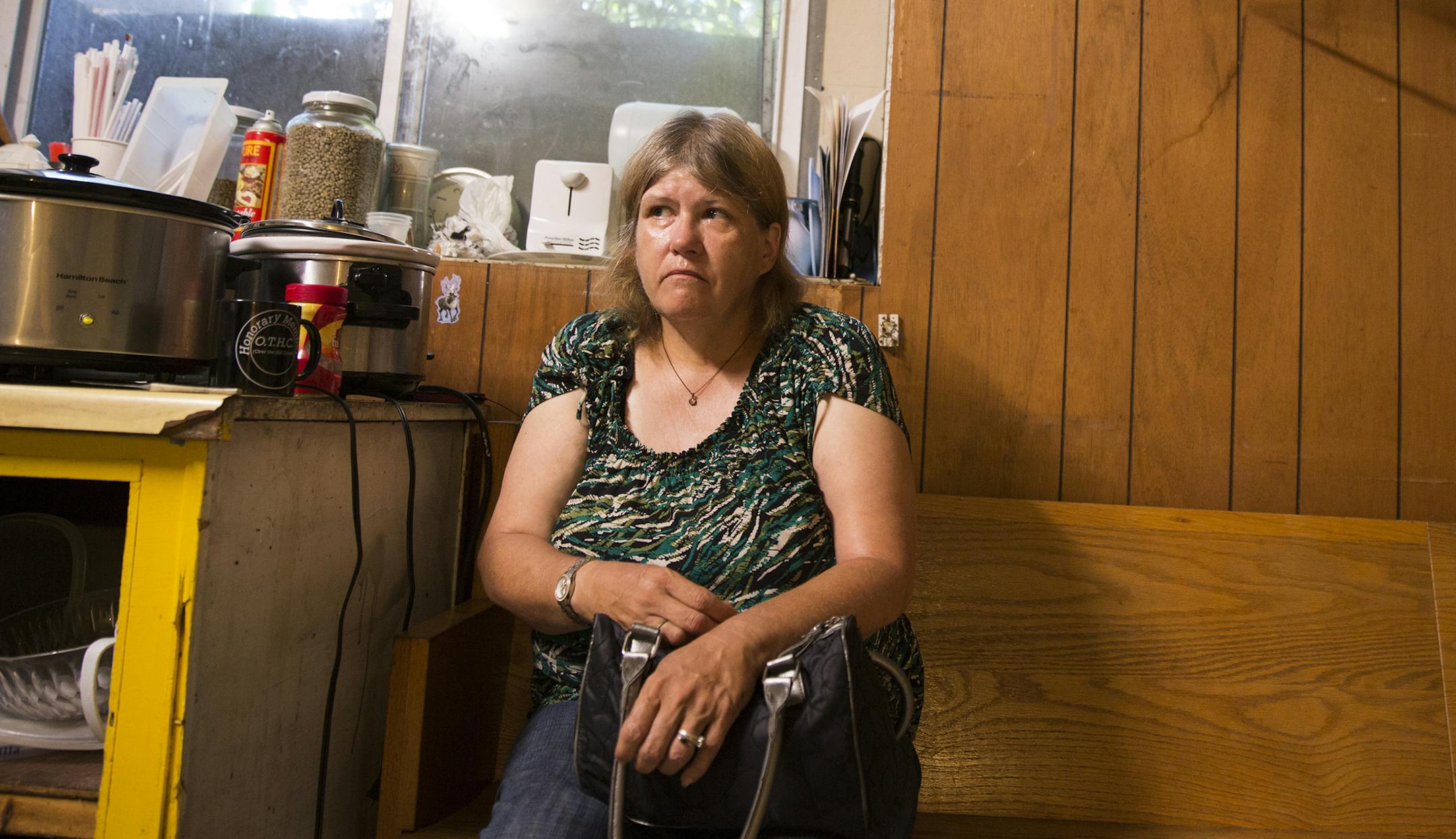 Suzanne Chute, who is homeless and living at Peoples Church, gets her morning coffee ready in the morning in the basement of the church in Bemidji on Friday, August 14, 2015. ] LEILA NAVIDI leila.navidi@startribune.com / BACKGROUND INFORMATION: The Nameless Coalition for the Homeless, an advocacy group in Bemidji, raised money to purchase a building after seeing a great need in the community for a homeless shelter in Bemidji that accepts people who are chronically inebriated. Currently, the Peop