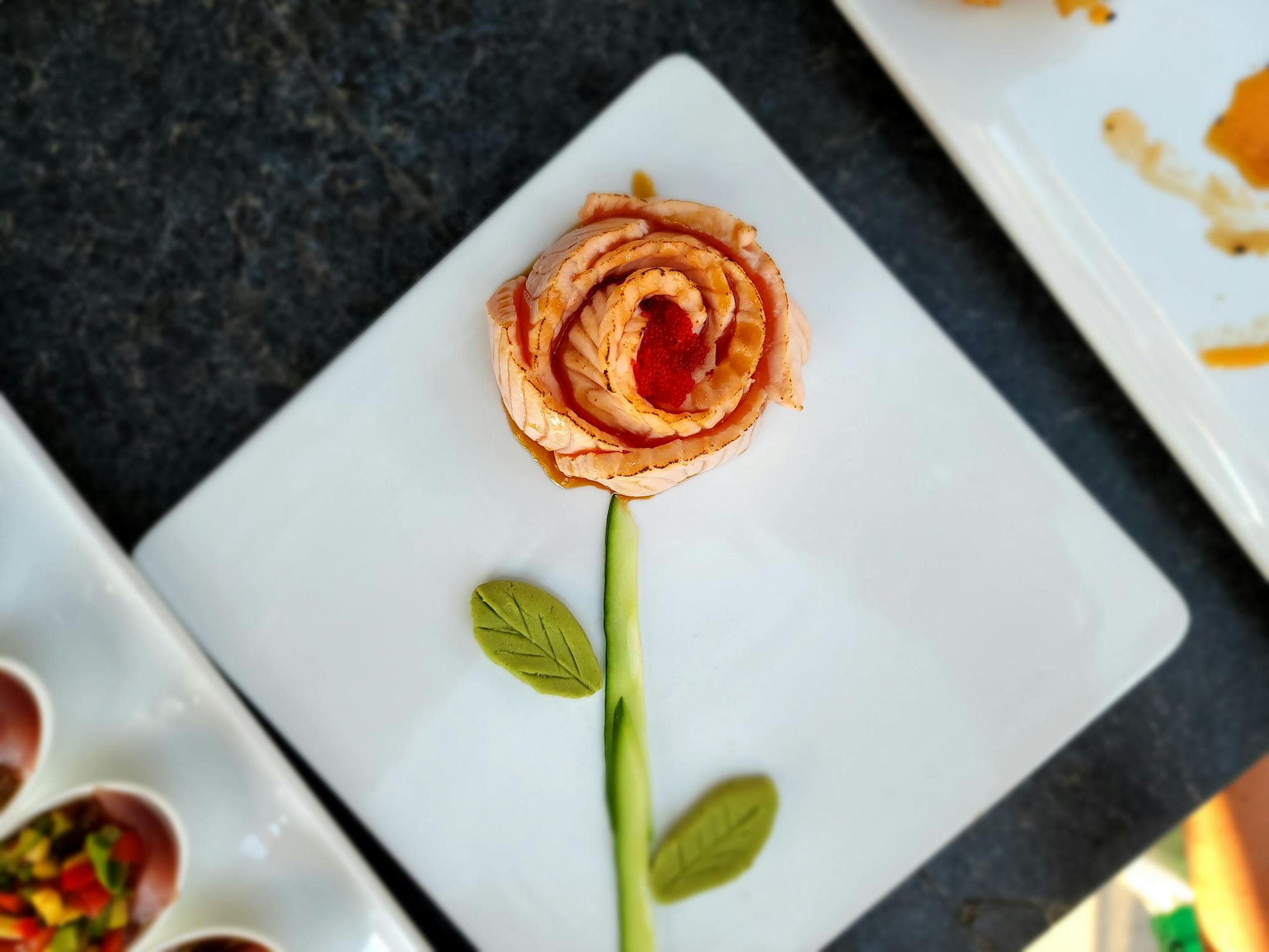 Seared salmon is plated like a flower at Kazoku in Minnetonka