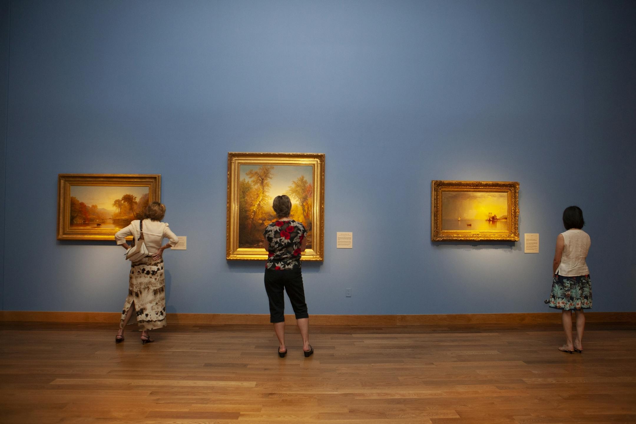 People view the Hudson River School collection at the Minnesota Marine Art Museum in Winona, Minnesota on Sept. 27, 2014. In addition to collections that include Monet, Picasso, Van Gogh, O'Keefe, and many other internationally acclaimed artists, the Minnesota Marine Art Museum has one of the best collections of Hudson River School art in the world.