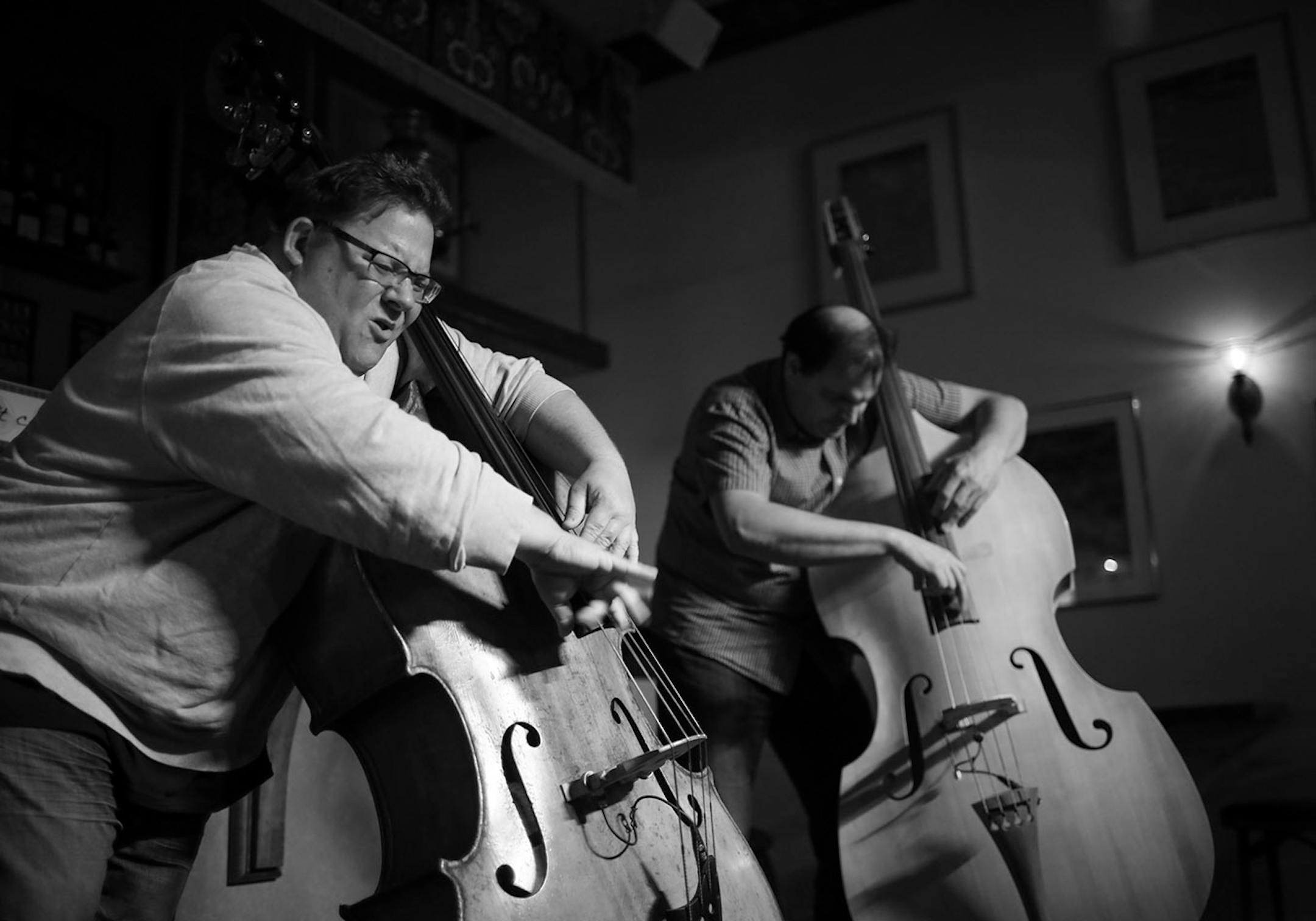 Adam Linz, left, and Chris Bates during their set of bass duets at Khyber Pass this month.